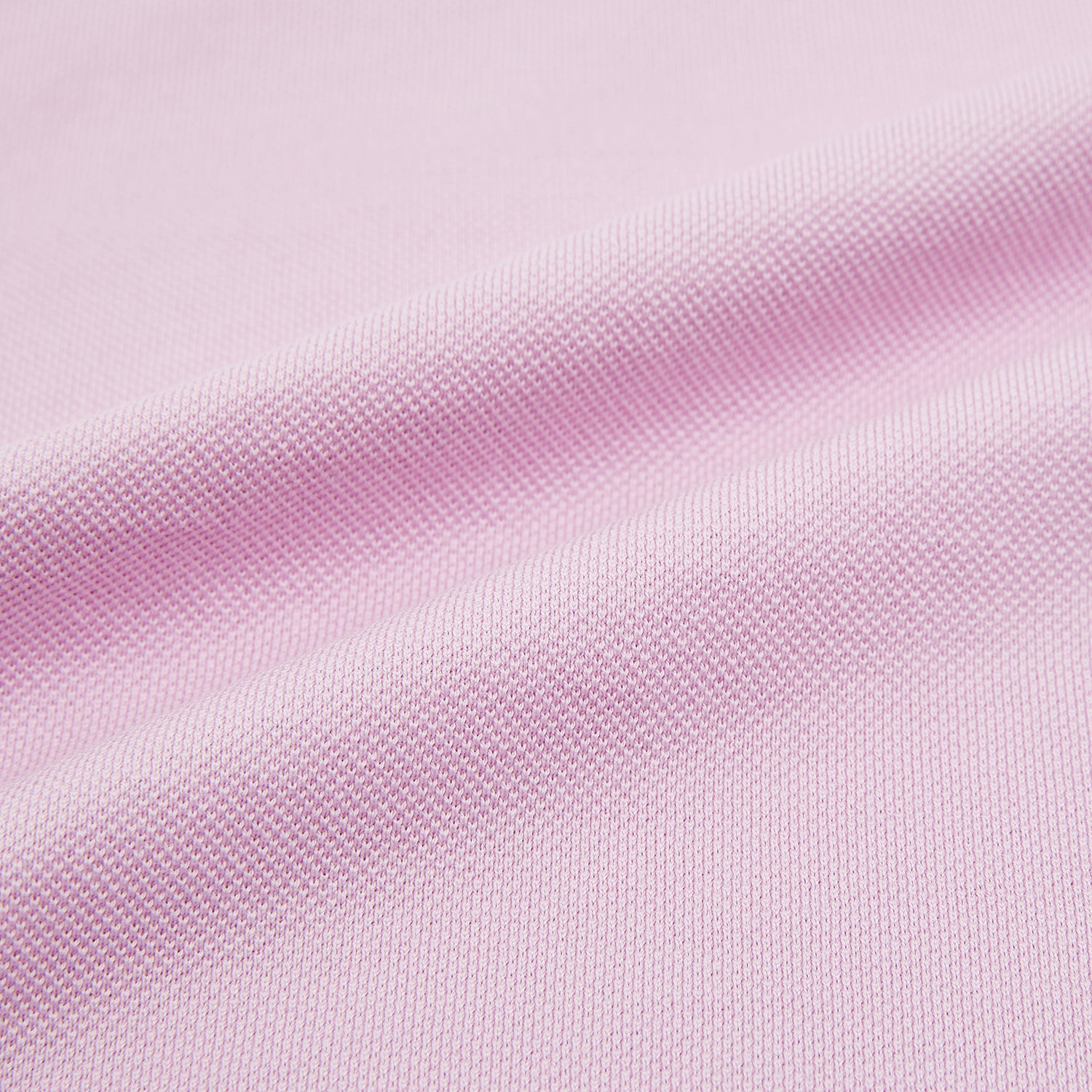 Image 5 of product The Turnbull & Asser Pink Polo Shirt is a men's cotton polo with short sleeves, a collar, three dark buttons, and a chest pocket with a button, shown laid flat on a white background.