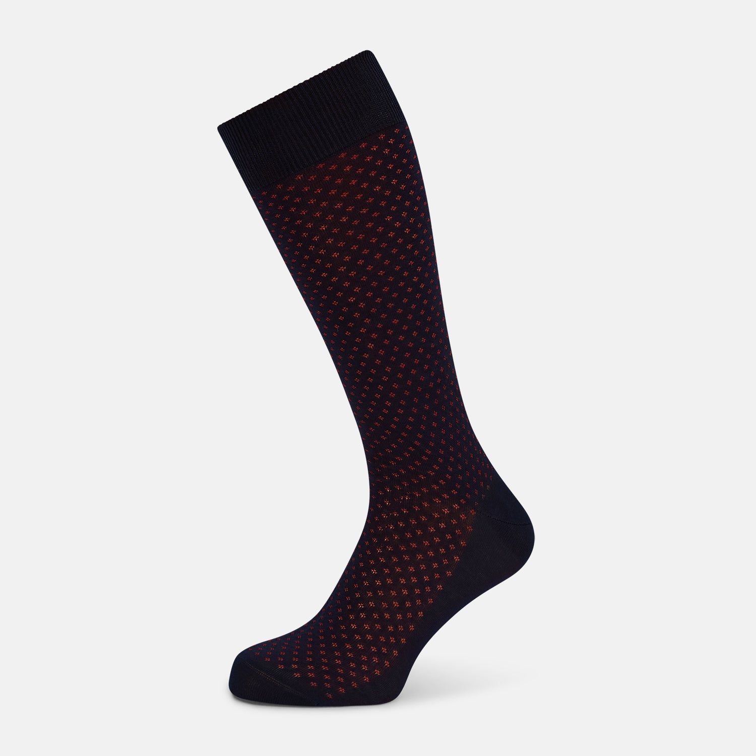 Image 1 of product A single Navy/Red Motif Mid-Length Sock by Turnbull & Asser, displayed upright on a white background. The sock features a calf-length style, ribbed cuff, hand-linked toe for comfort, and a subtle red pattern.