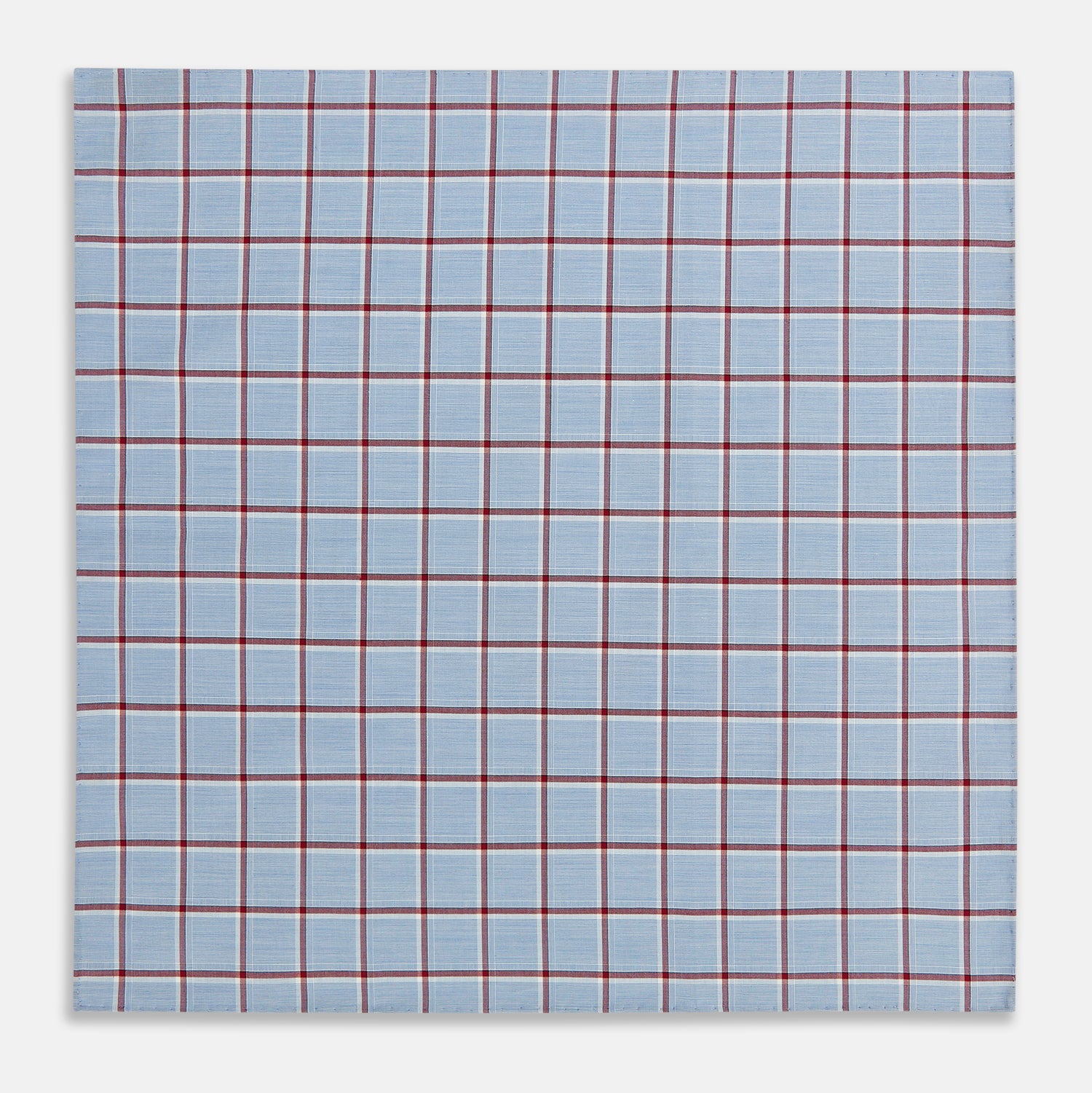 Image 2 of product The Turnbull & Asser Blue and Burgundy Windowpane Check Hand-Rolled Handkerchief features a light blue fabric with white, red, and dark blue stripes forming a classic plaid grid.