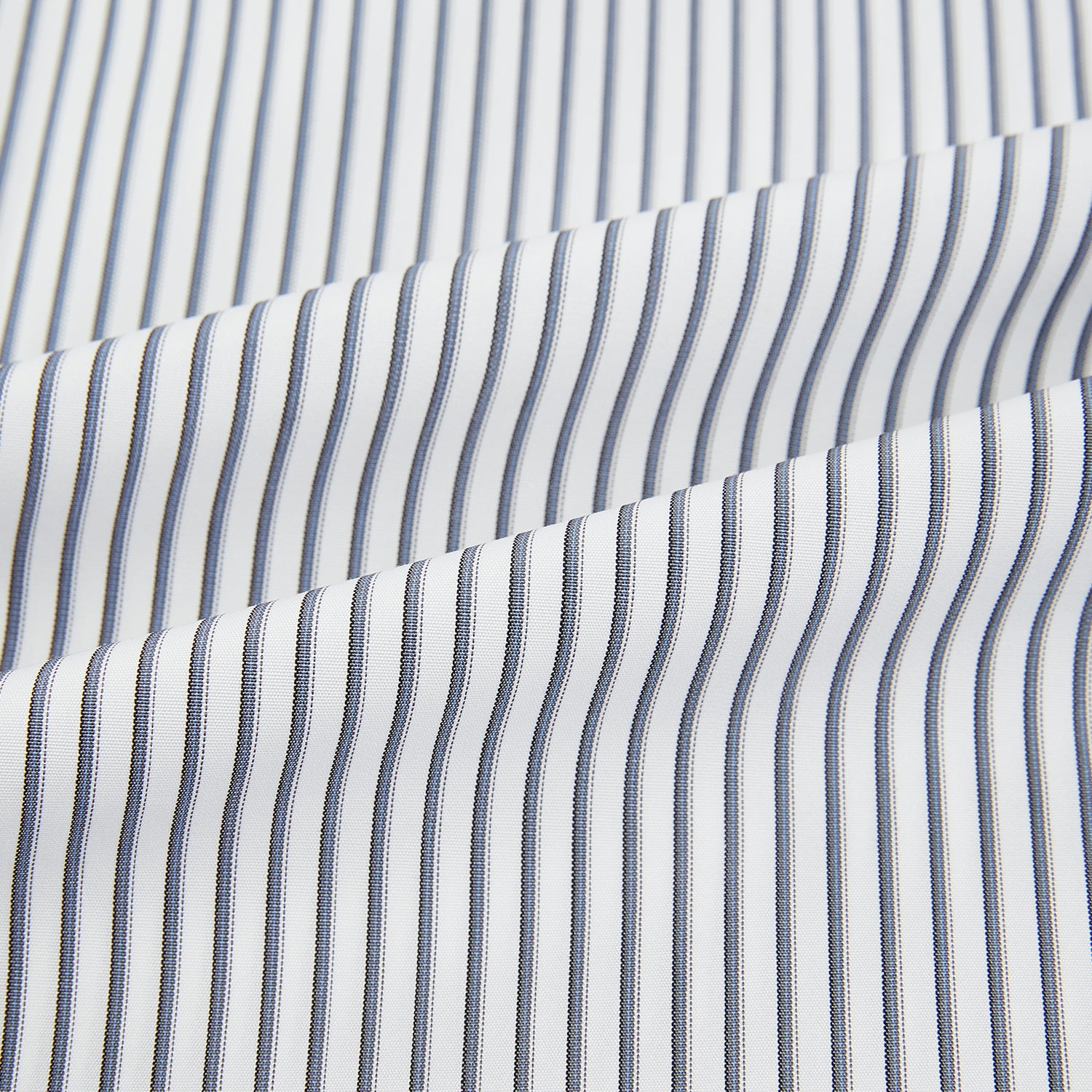 Image 6 of product The Turnbull & Asser Grey Multi Stripe Mayfair Shirt features long sleeves, a classic collar, and thin vertical stripes in black and white, shown laid flat on a white background.