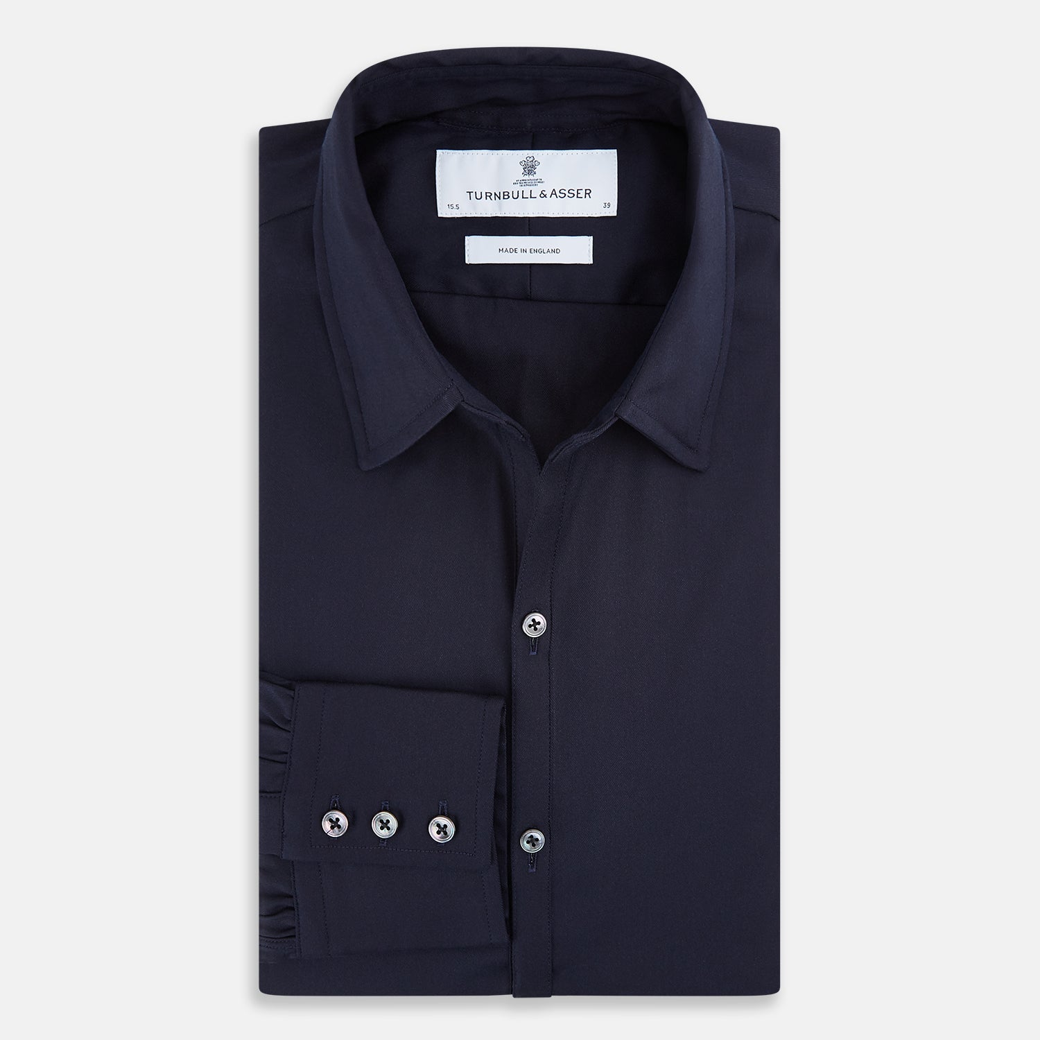 Image 5 of product The Navy Twill Windsor Shirt by Turnbull & Asser features long sleeves, a button-up front, British craftsmanship, and a refined Windsor collar, shown in dark navy on a plain white background.