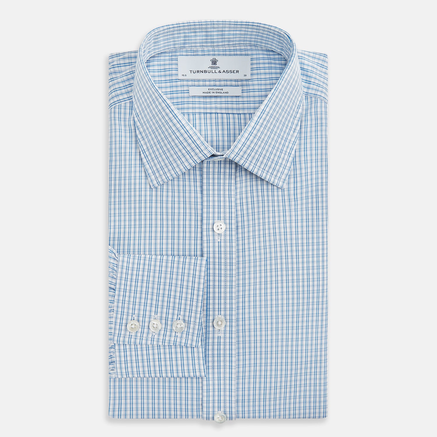 Image 5 of product The Sky Blue Micro Graph Check Mayfair Shirt by Turnbull & Asser features a classic T&A collar, button-down front, and buttoned cuffs, shown laid flat on a white background.