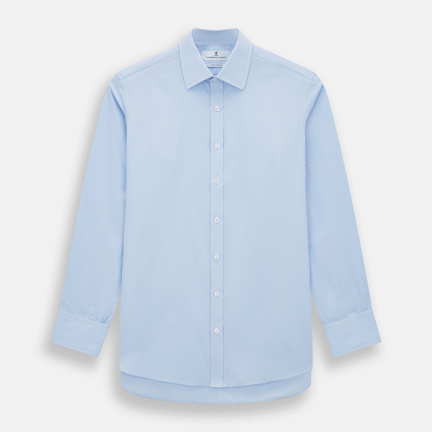 Image 1 of product The Pale Blue Rhombus Mayfair Shirt by Turnbull & Asser features long sleeves, a classic collar, white buttons, and buttoned cuffs, shown laid flat on a white background.