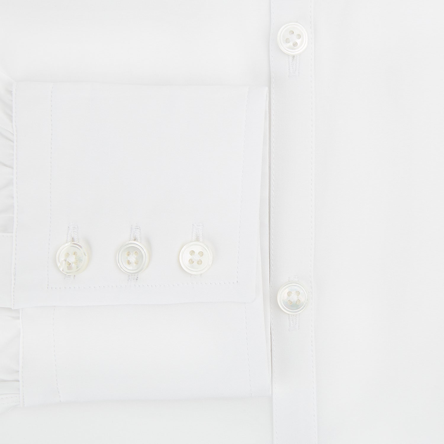 Image 4 of product The Turnbull & Asser White Westminster Shirt is a long-sleeve, button-up dress shirt with a classic cut and Westminster collar, shown on a white background.