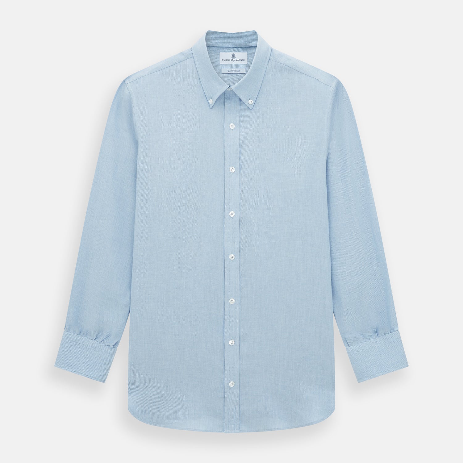 Image 1 of product The Turnbull & Asser Pale Blue Cotton Cashmere Dorset Collar Richmond Shirt features long sleeves, a button-down collar, white buttons, and a chest pocket. It is neatly displayed flat on a white background.