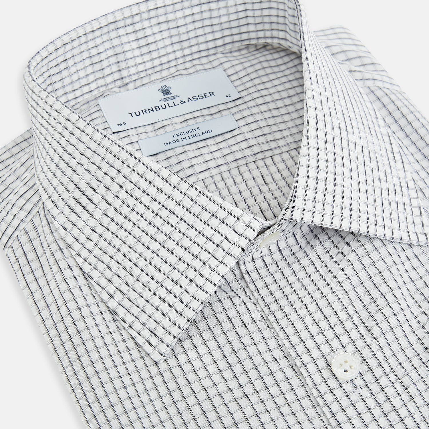 Image 2 of product The Midnight Blue Multi Check Mayfair Shirt by Turnbull & Asser is a pure cotton, long-sleeve button-down featuring a small blue multi-check pattern, pointed collar, and buttoned cuffs.