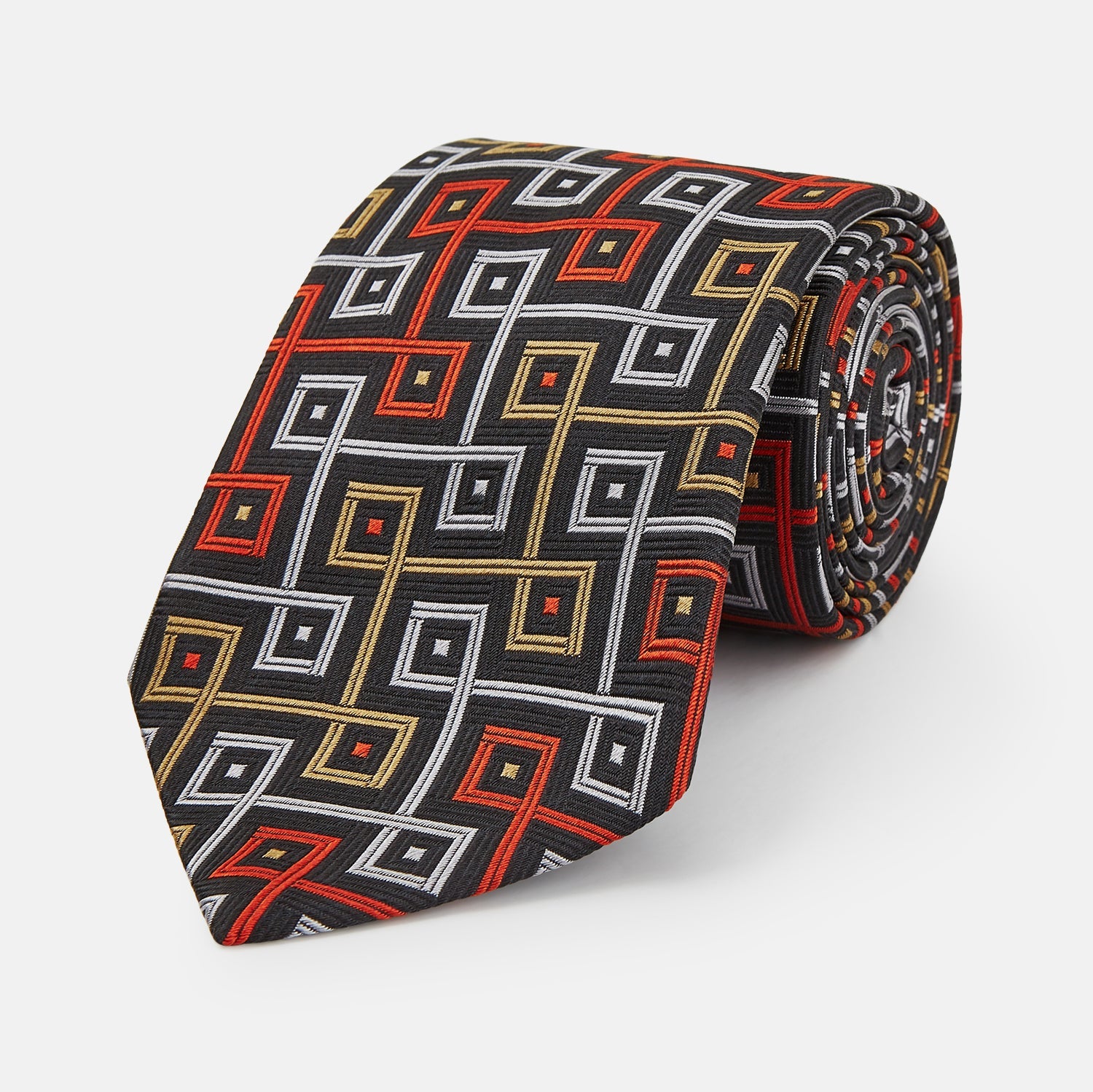 Image 1 of product The Turnbull & Asser "The World Is Not Enough" Square Silk Tie, as seen on James Bond, features a geometric diamond pattern in black, red, yellow, and white on gray—an ideal stylish gift for any Bond fan.