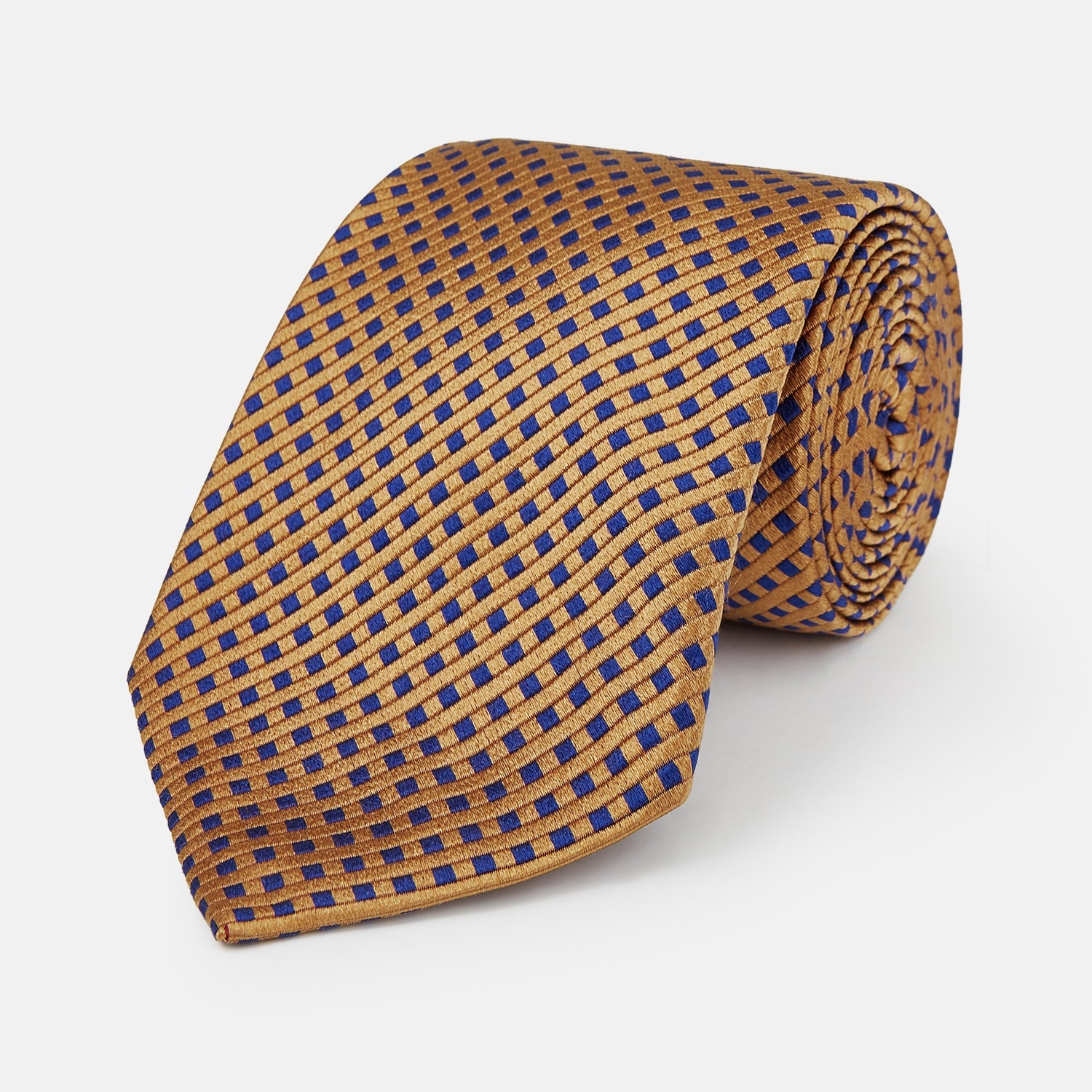 Image 1 of product The Turnbull & Asser Tomorrow Never Dies Diamond Silk Tie, as seen on James Bond, features a gold and navy checkered pattern—an ideal gift for any Bond fan. Displayed rolled against a plain white background.