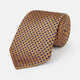 The Turnbull & Asser Tomorrow Never Dies Diamond Silk Tie, as seen on James Bond, features a gold and navy checkered pattern—an ideal gift for any Bond fan. Displayed rolled against a plain white background.