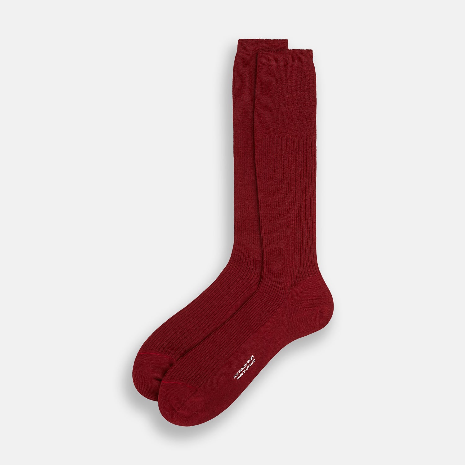 Image 2 of product A single Burgundy Mid-Length Merino Sock by Turnbull & Asser, ribbed and crafted from soft merino wool, is displayed upright against a plain white background.