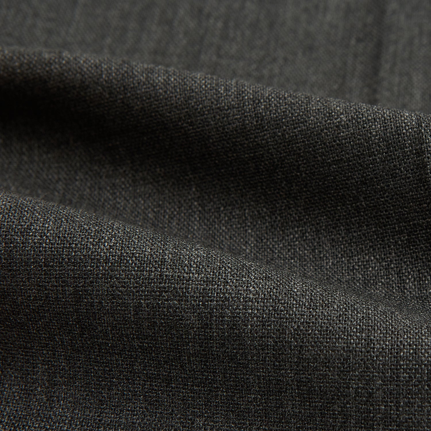 Image 6 of product The Turnbull & Asser Charcoal Rupert Trousers, crafted from wool and cashmere with belt loops, button closure, and a slim tailored fit, are shown against a plain white background.