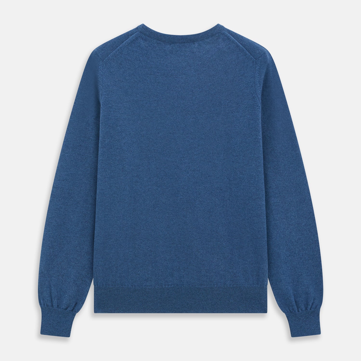 Image 4 of product The Turnbull & Asser Blue Crew Neck Cashmere Jumper is laid flat on a white background, showcasing ribbed cuffs, hem, and neckline for an elegant, smart-casual style.