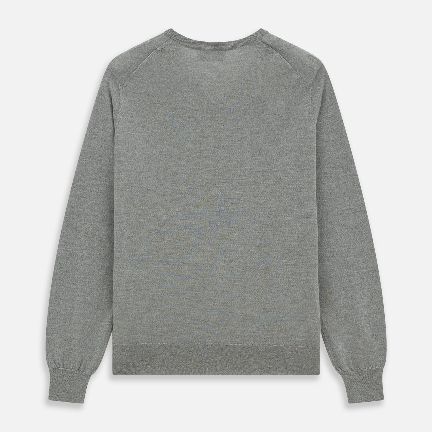 Image 4 of product The Grey V-Neck Merino Wool Jumper by Turnbull & Asser features long sleeves with ribbed cuffs and hem, making it a versatile wardrobe essential for any gentleman. Shown here in classic light grey on a white background.