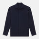 The Turnbull & Asser Navy Pique Shirt is a long-sleeved, dark navy button-up with a left chest pocket, classic collar, and buttoned cuffs, shown laid flat on a white background.