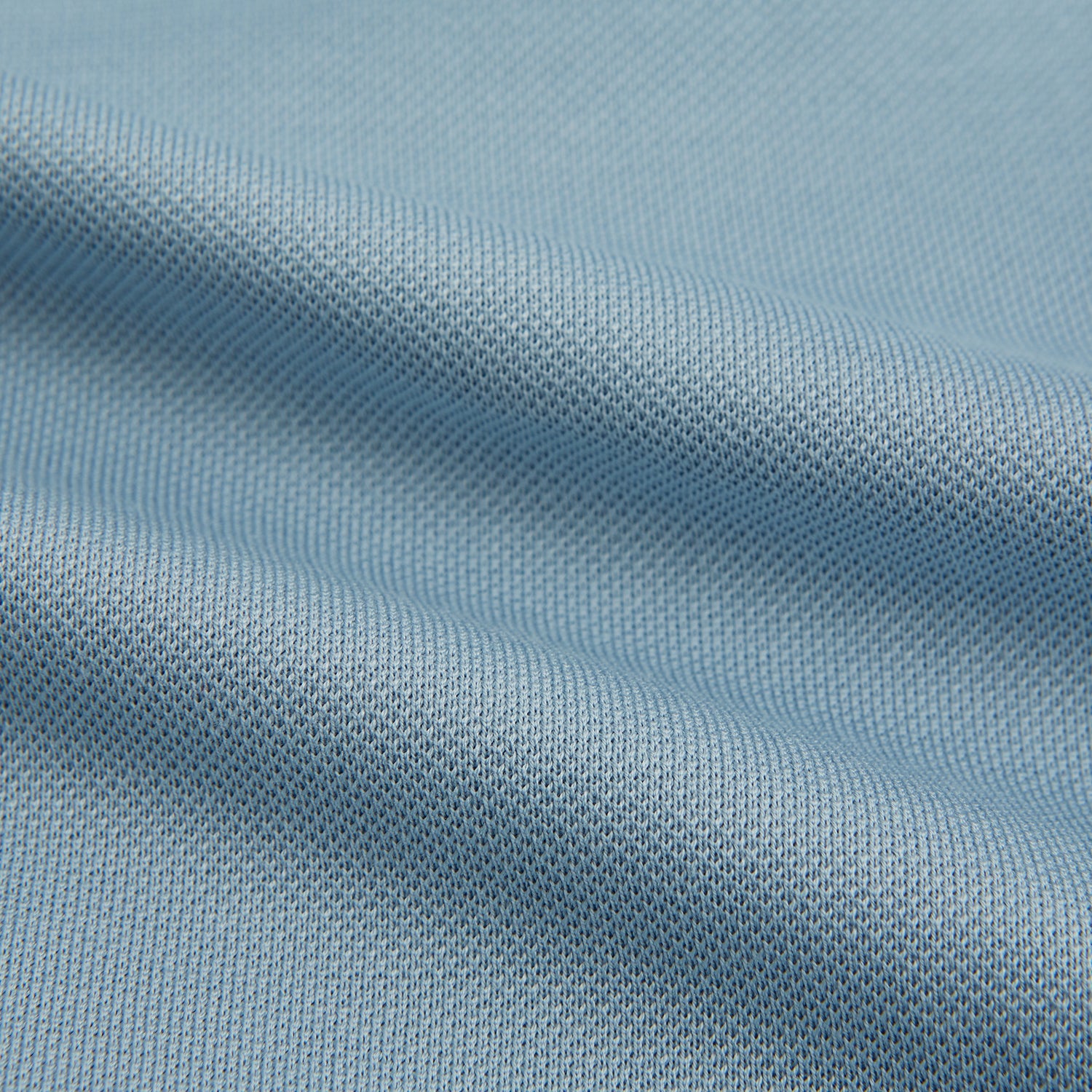 Image 6 of product The Turnbull & Asser Pale Blue Pique Shirt is a long-sleeve button-up with an open collar, single chest pocket, and beige buttons, shown against a white background.