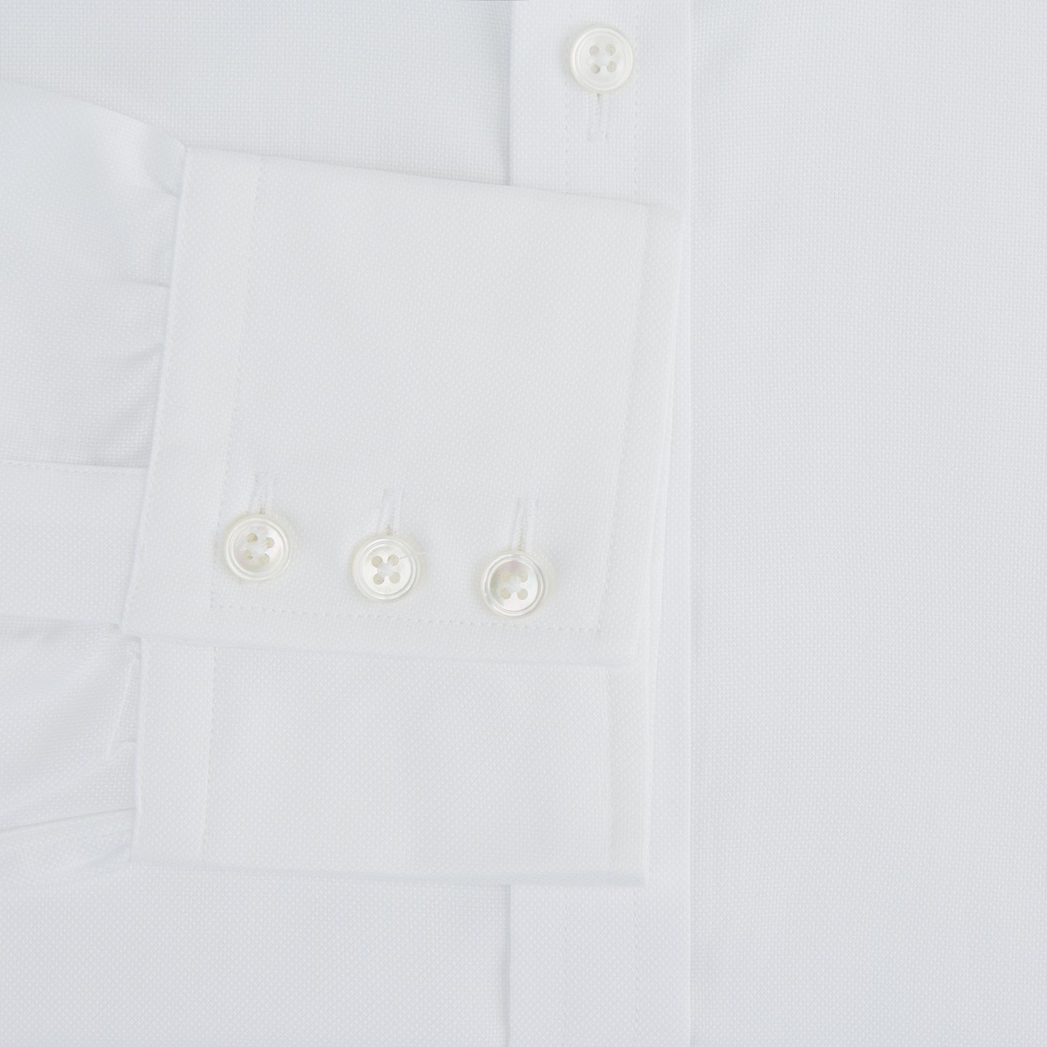 Image 4 of product The White Royal Oxford Cotton Shirt by Turnbull & Asser features a button-down collar and 3-button cuffs—ideal for minimalist looks. Shown against a plain white background.
