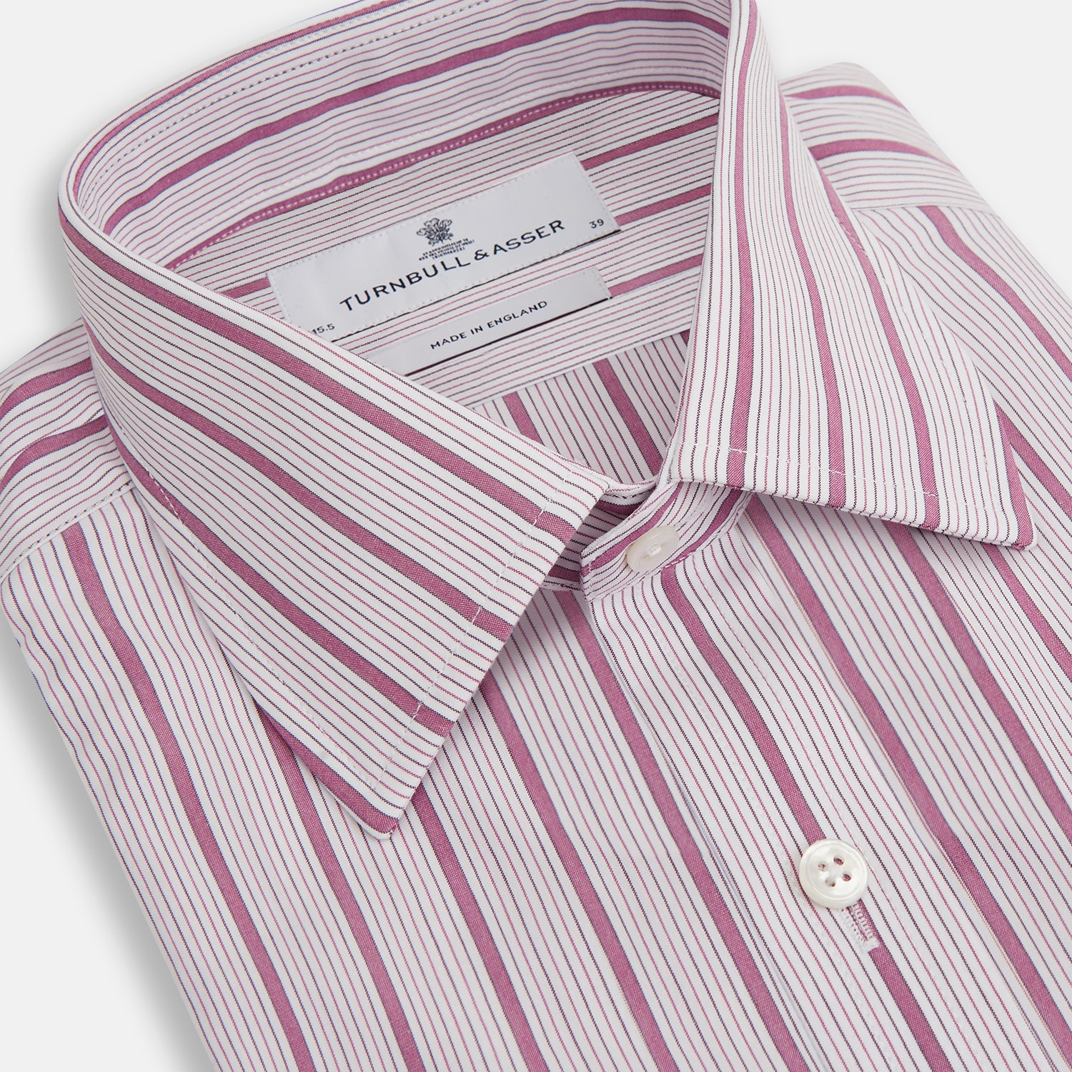 Image 2 of product A long-sleeved, collared Turnbull & Asser Purple Multi Track Stripe Mayfair Shirt with buttons, showcasing vertical purple multi-colored stripes, neatly displayed against a plain background.