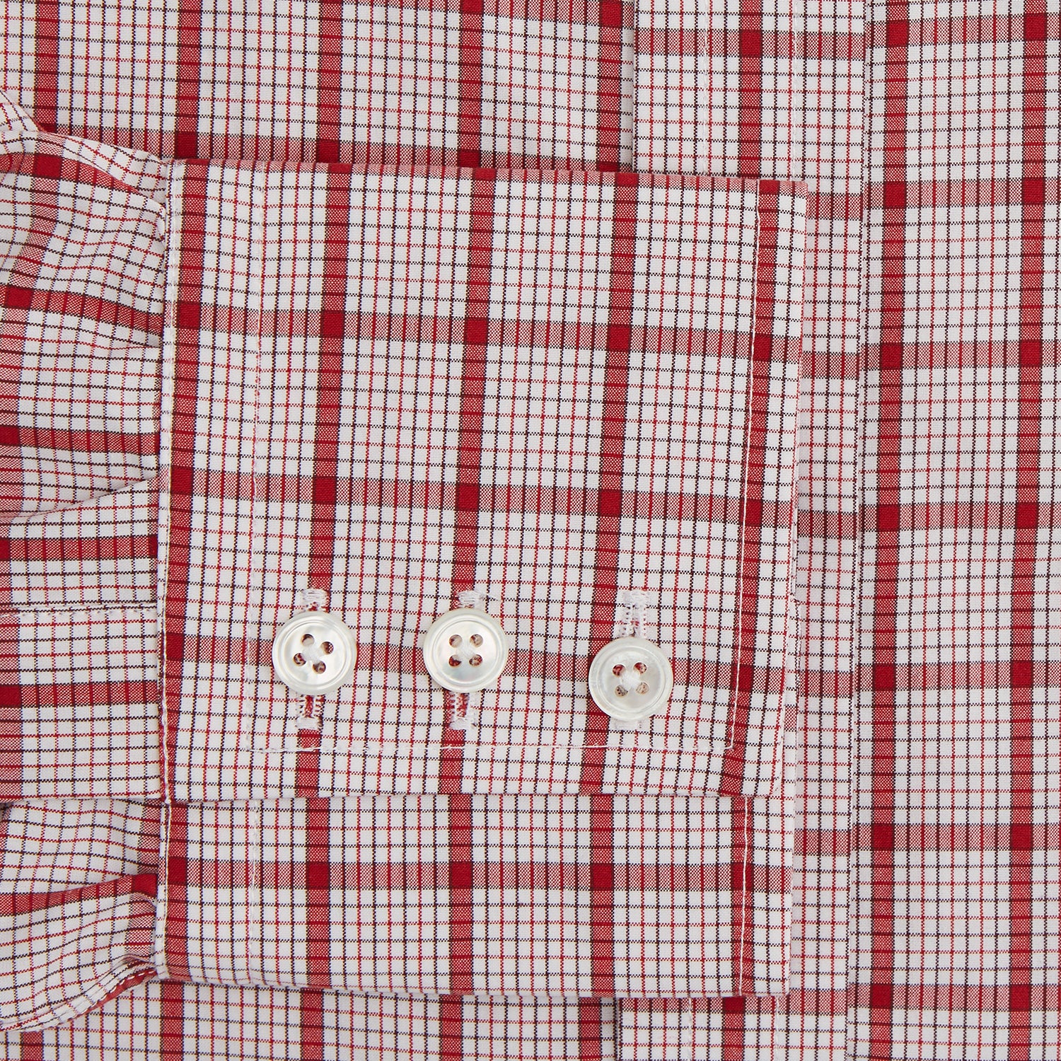 Image 3 of product The Red Graph Overlay Check Mayfair Shirt by Turnbull & Asser is a long-sleeved, button-up shirt with a white base and red check pattern, featuring a collar and buttoned cuffs. Displayed on a plain white background.