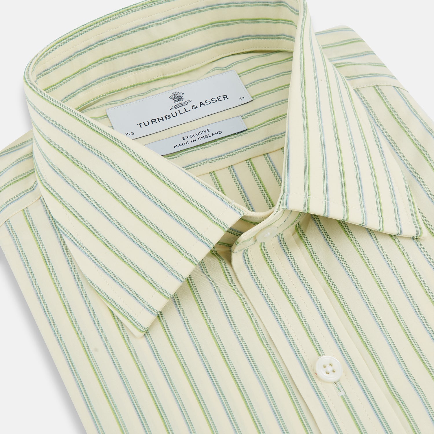 Image 2 of product The Green Double Stripe Mayfair Shirt by Turnbull & Asser features light green and white vertical stripes, long sleeves, a T&A collar, and buttoned cuffs. Made from organic cotton and shown laid flat on a white background.