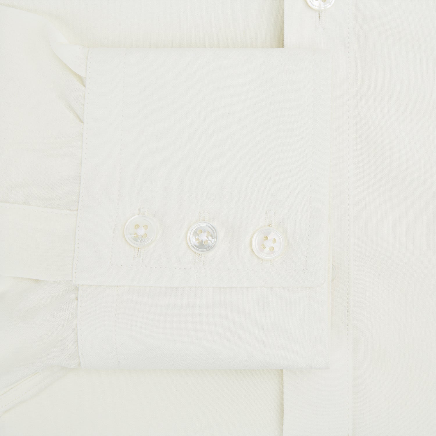 Image 4 of product The Turnbull & Asser Cream Silk Chelsea Shirt is an elegant white long-sleeve, button-up silk shirt with a single chest pocket, shown against a plain white background.