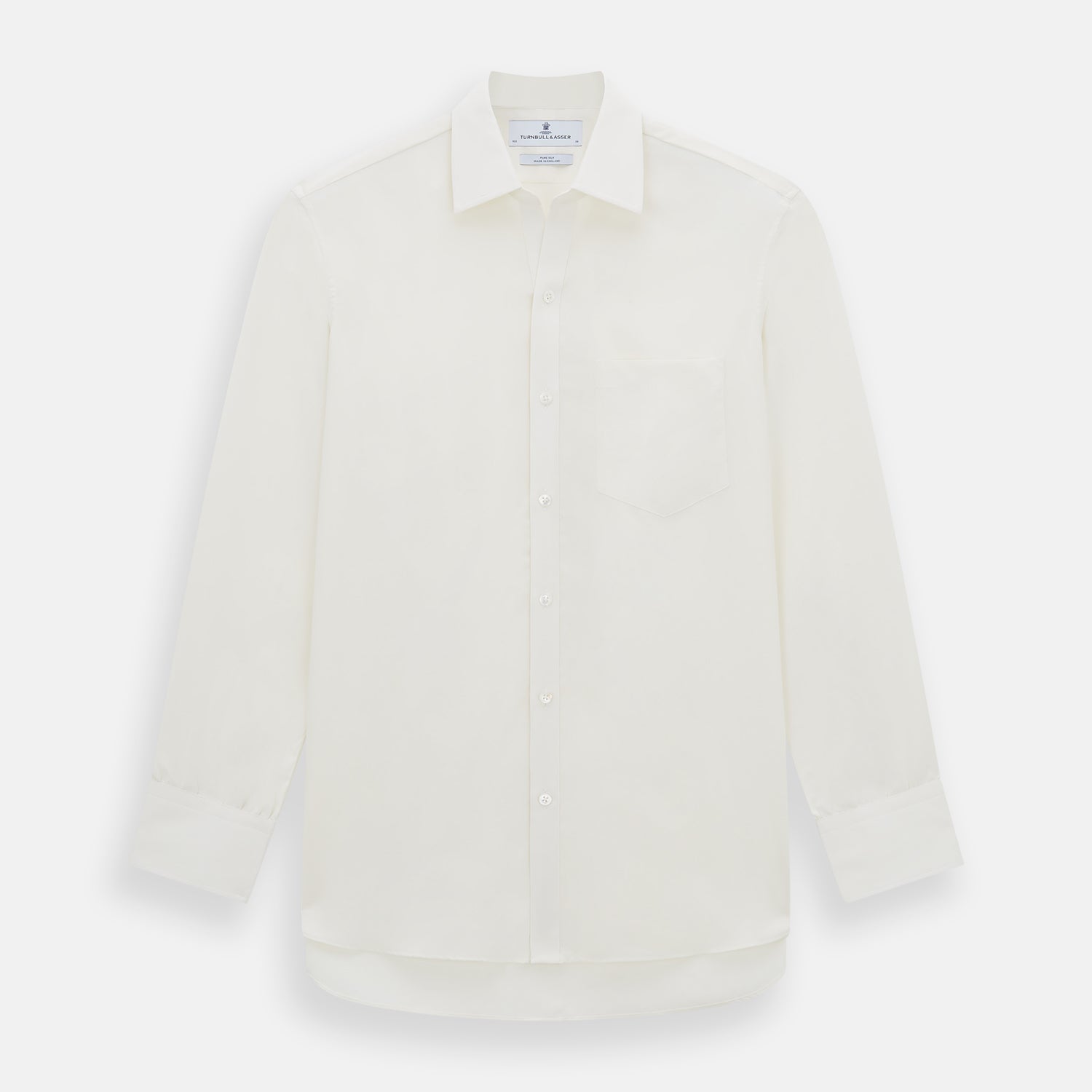 Image 1 of product The Turnbull & Asser Cream Silk Chelsea Shirt is an elegant white long-sleeve, button-up silk shirt with a single chest pocket, shown against a plain white background.