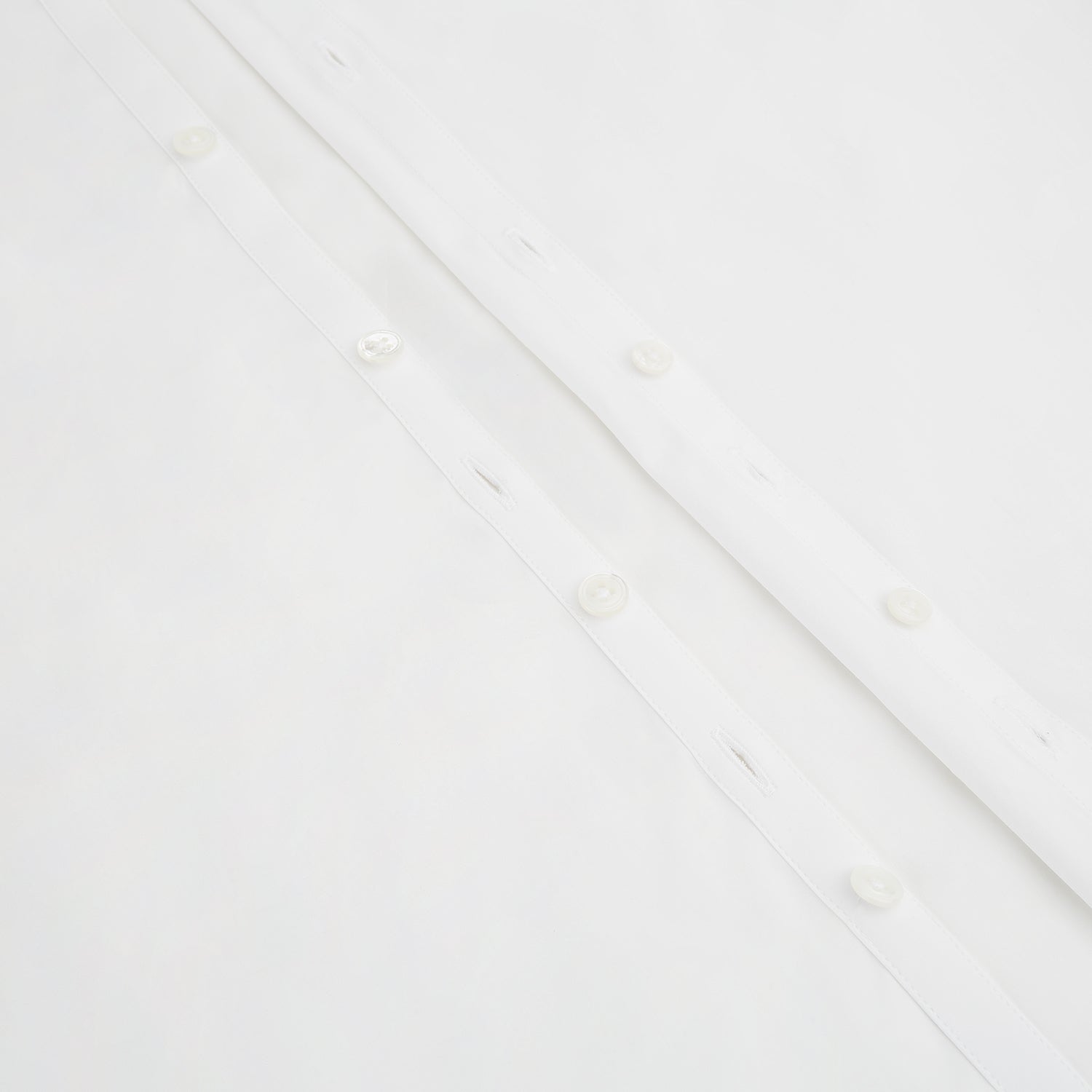 Image 7 of product The Turnbull & Asser White Westminster Shirt is a long-sleeve, button-up dress shirt with a classic cut and Westminster collar, shown on a white background.