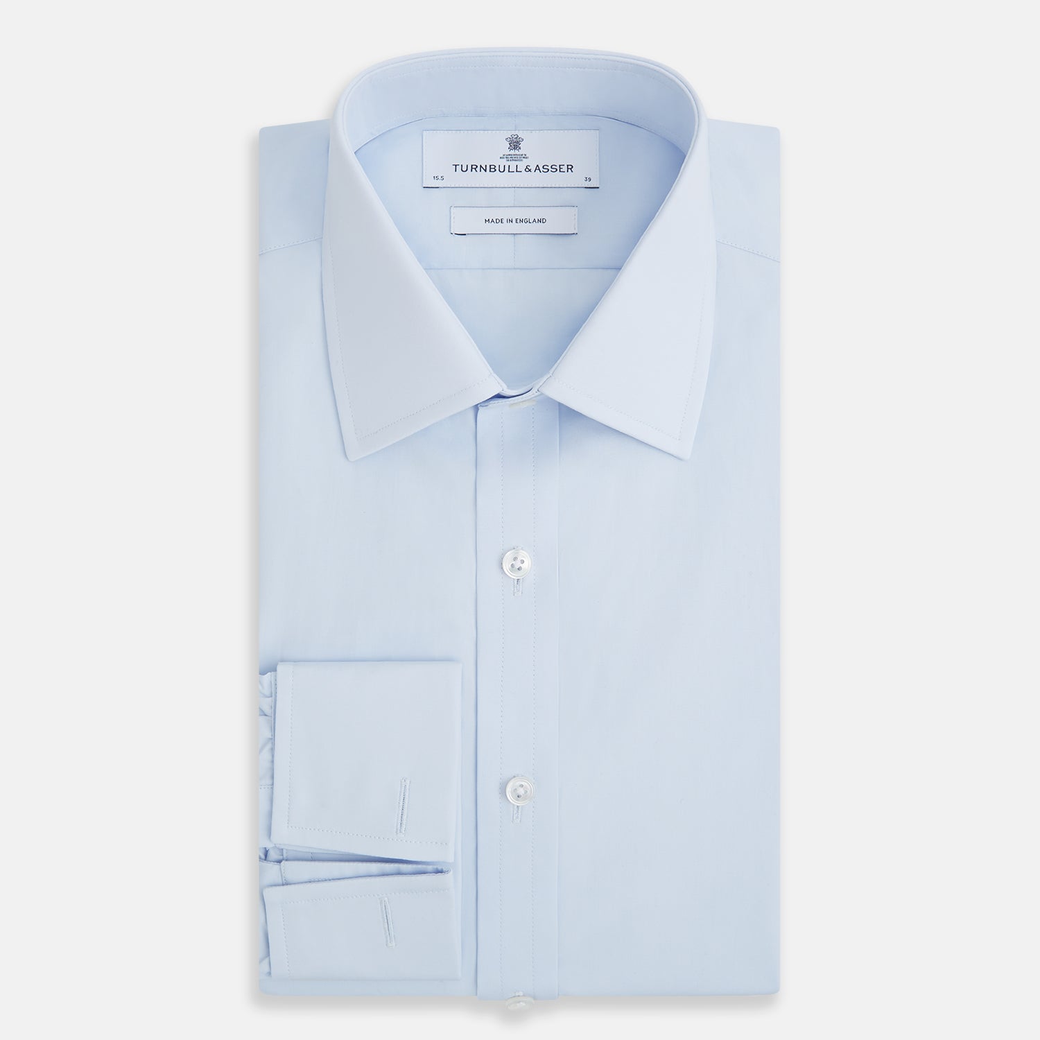 Image 5 of product The Turnbull & Asser Light Blue Mayfair Shirt features white buttons, a classic collar, and buttoned cuffs—styled flat on a white background, it’s ideal for minimalist outfits or pairing with bold ties.