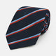 The Turnbull & Asser Red And Blue Stripe Silk Blend Tie, rolled on a white background, features refined diagonal accents—an elegant formal accessory.