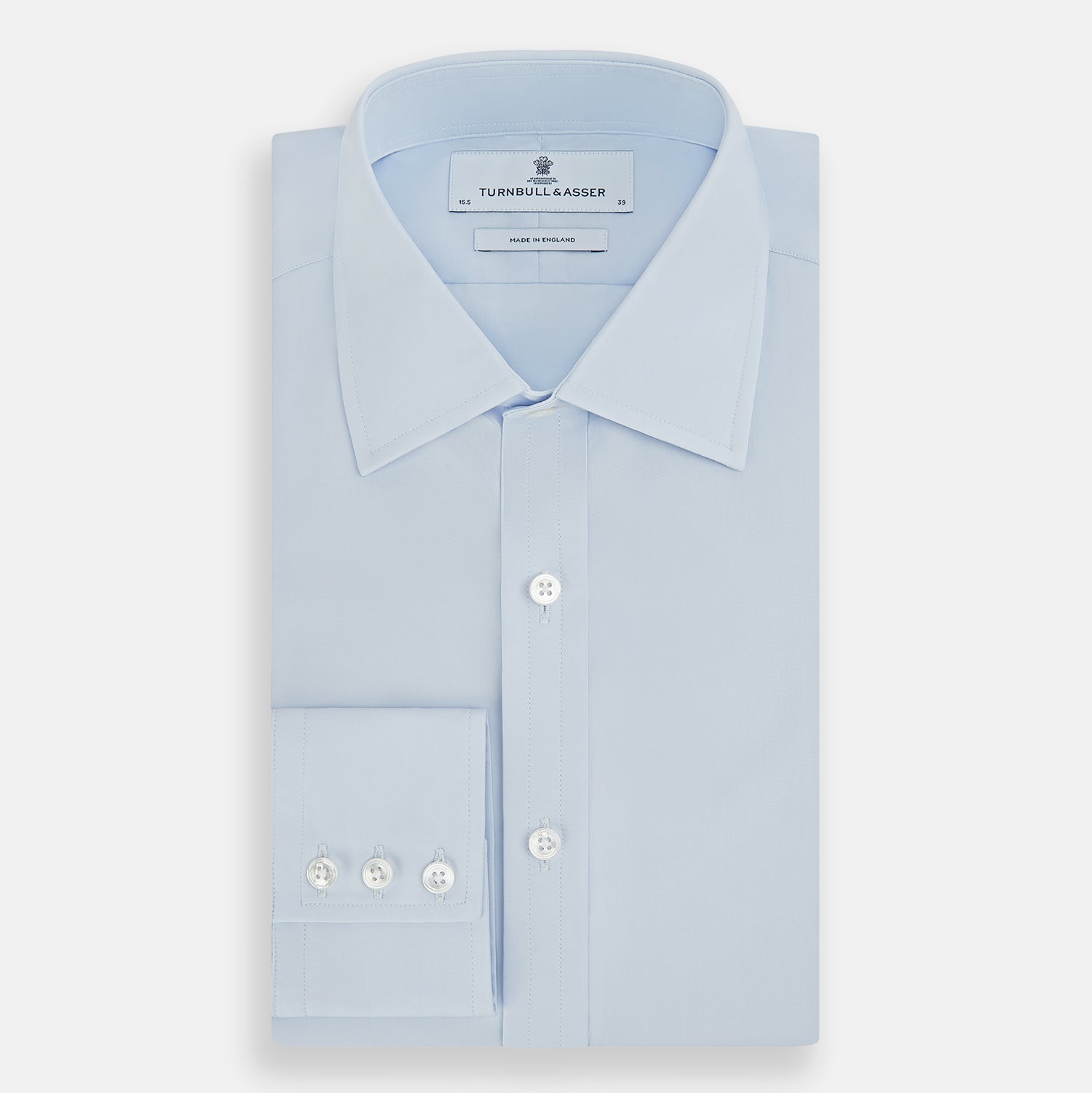 Image 5 of product The Turnbull & Asser Pale Blue Cotton Regular Fit Mayfair Shirt features a classic collar, white buttons, and buttoned cuffs. This long-sleeve dress shirt displays the timeless Mayfair silhouette for a refined look.