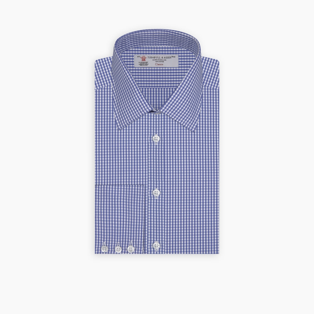 Image 1 of product The Turnbull & Asser Mid-Blue Gingham Check Shirt features a T&A collar and 3-button cuffs, crafted from cotton and displayed folded on a plain white background.