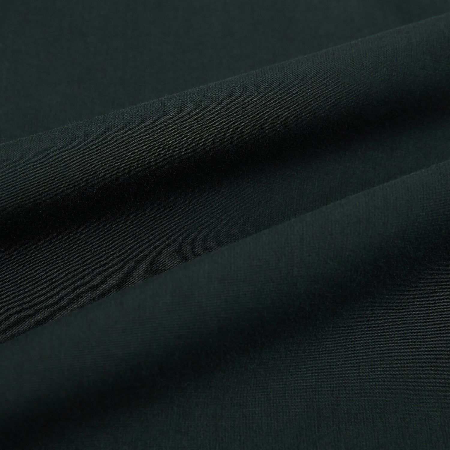 Image 8 of product The FOREST GREEN WINDSOR SHIRT by Turnbull & Asser features long sleeves, a Windsor collar, and buttoned cuffs, reflecting British craftsmanship. Displayed on a plain white background.