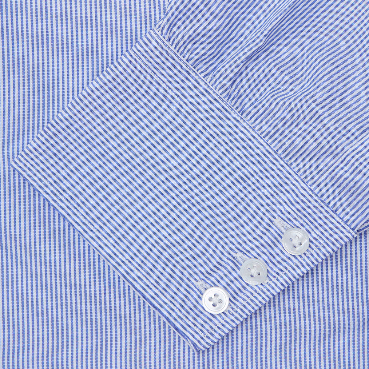 Image 3 of product The Turnbull & Asser Blue Fine Bengal Stripe Shirt features a classic T&A collar, 3-button cuffs, and white buttons, crafted from fine cotton and displayed against a crisp white background.