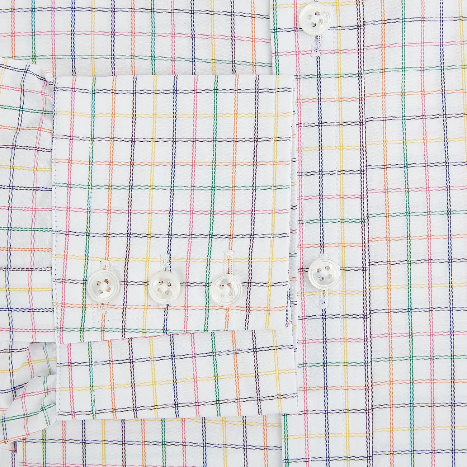 Image 4 of product The Rainbow Double Grid Check Mayfair Shirt by Turnbull & Asser features a white base with thin blue, red, and green checks and a T&A collar. It’s displayed neatly laid flat on a white background.