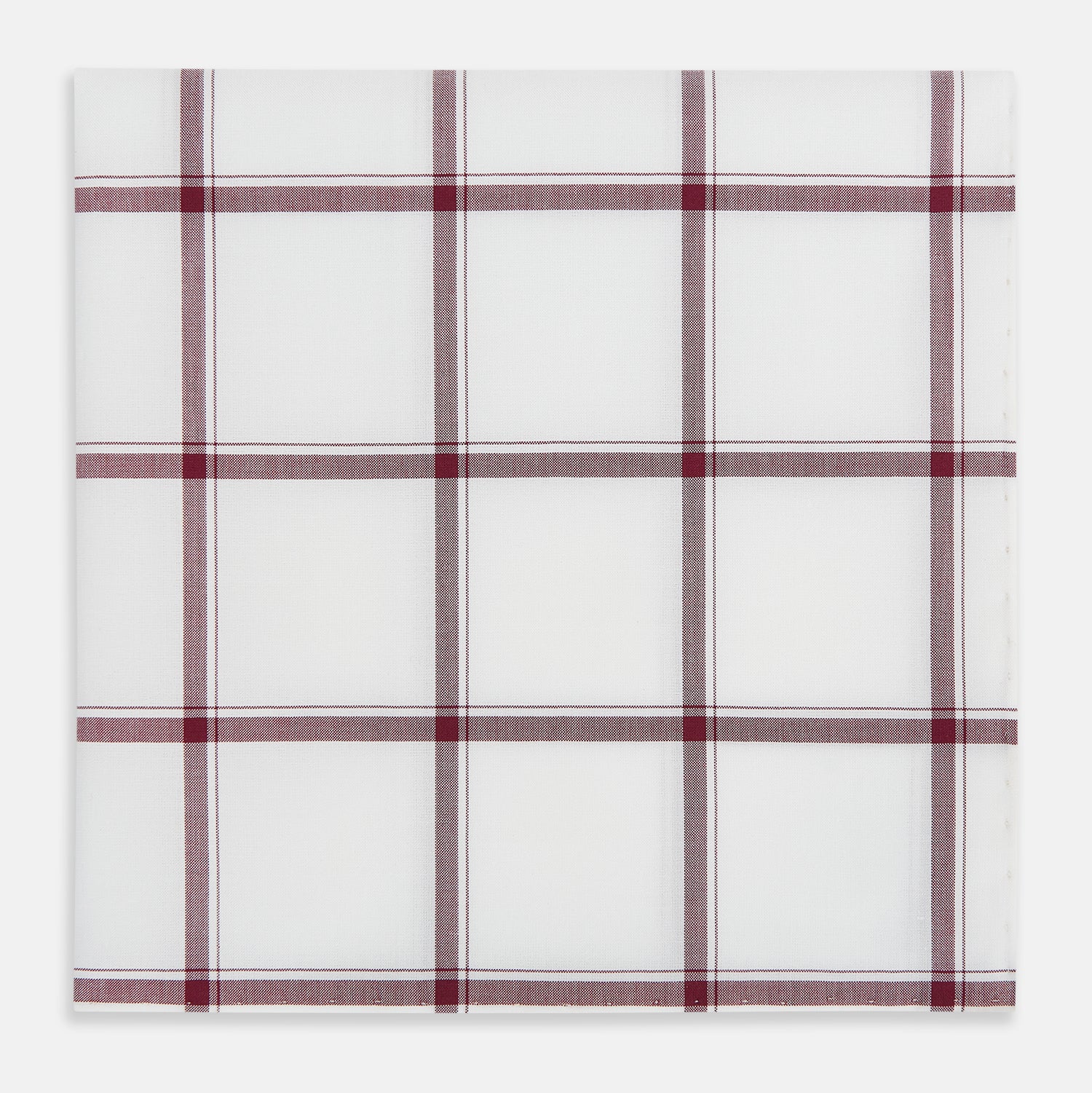 Image 1 of product The Turnbull & Asser Burgundy Grid Check Hand-Rolled Handkerchief features a white base with burgundy grid lines forming large squares and is finished with elegant hand-rolled edges.