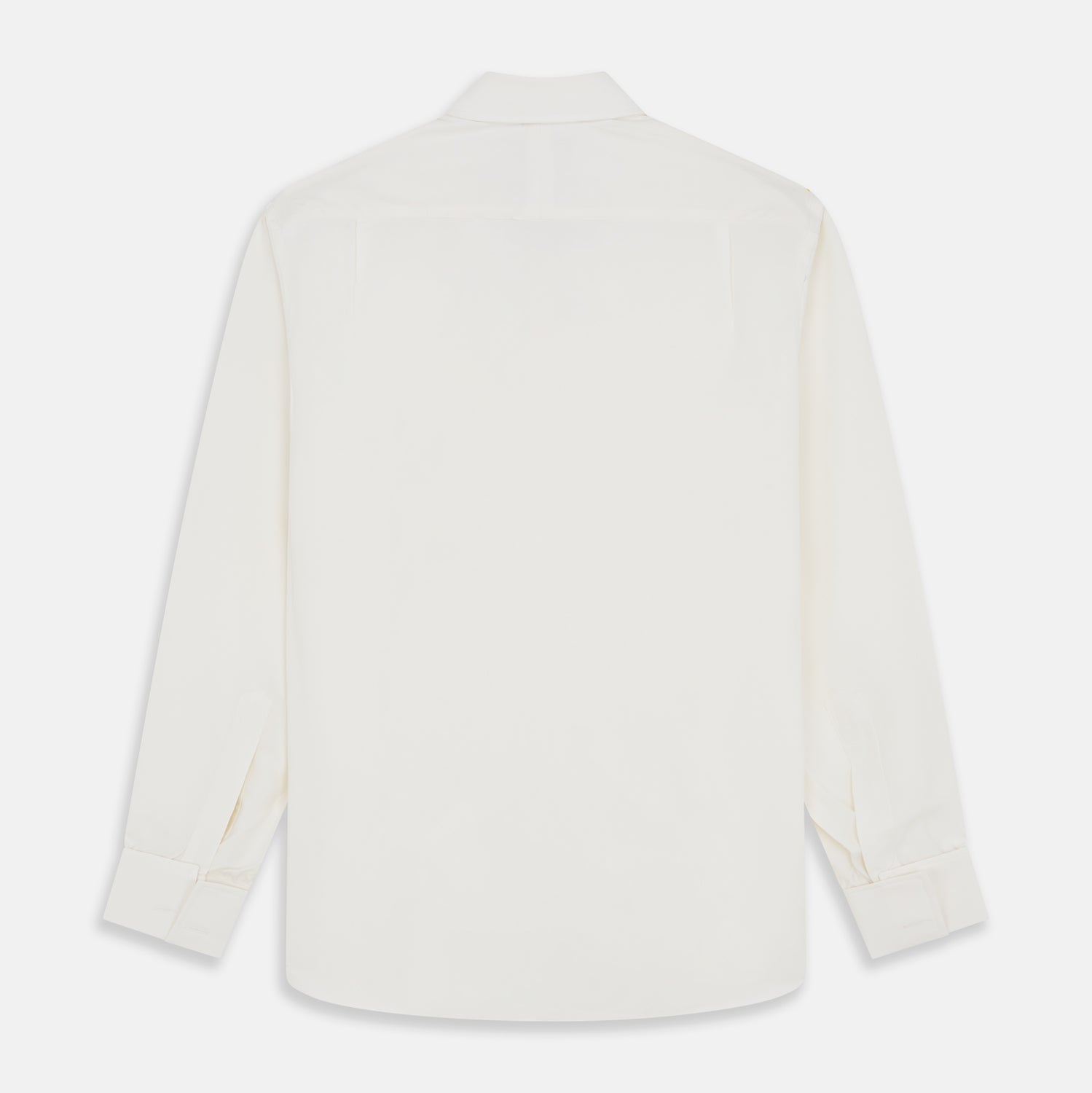 Image 3 of product The Cream Silk Whitby Shirt by Turnbull & Asser features a pointed collar, buttoned front and cuffs, and long sleeves, shown in Whitby Fit and laid flat on a white background.