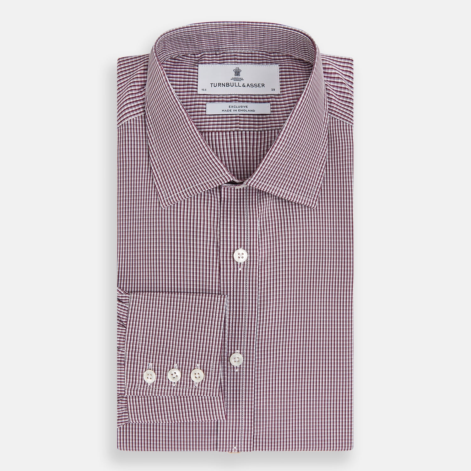 Image 5 of product The Turnbull & Asser Burgundy Micro Check Mayfair Shirt features long sleeves, a pointed collar, and white buttons—perfect for formal wear. Shown laid flat on a white background.