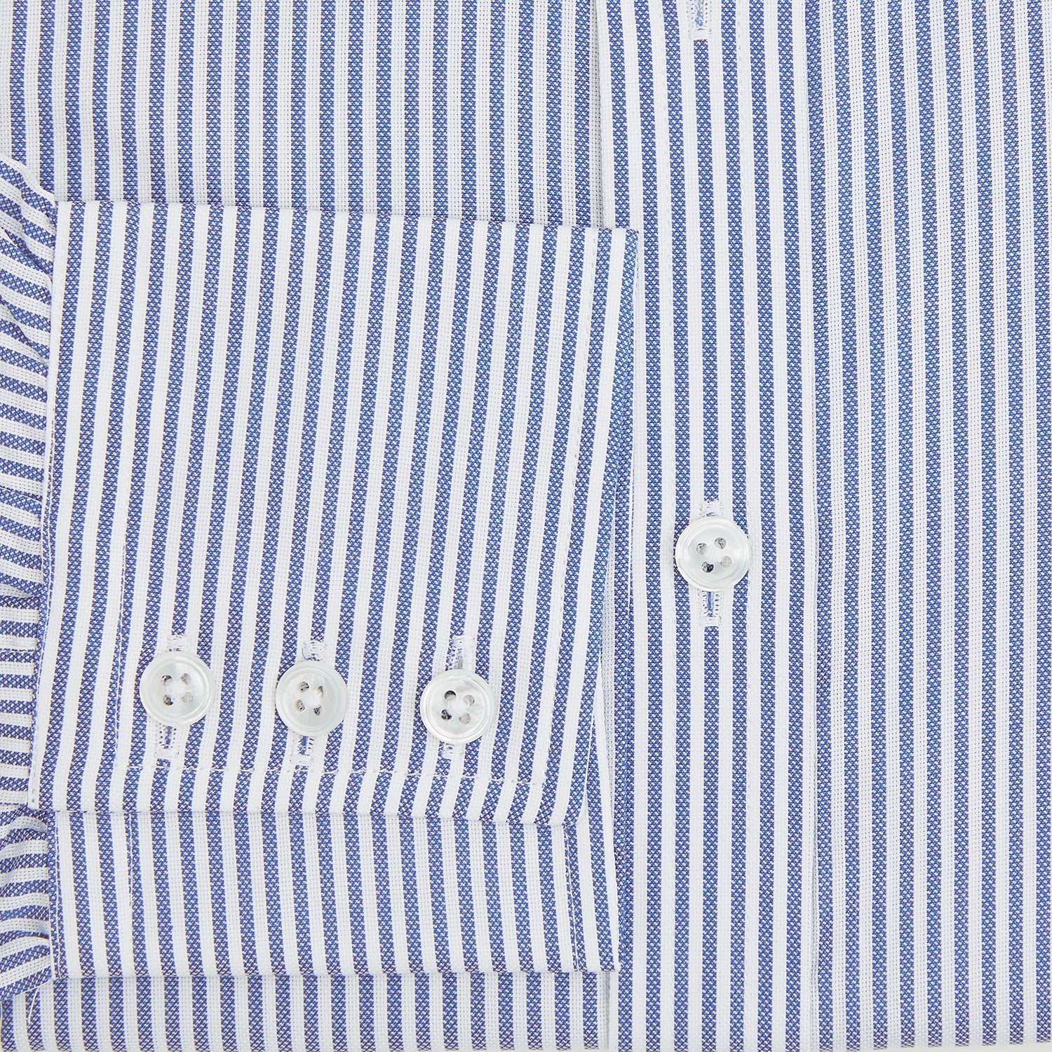 Image 4 of product The Turnbull & Asser Navy Bengal Stripe Mayfair Shirt is a long-sleeved, collared formal shirt with blue and white stripes, white buttons, and buttoned cuffs—ideal for classic style enthusiasts. Displayed on a plain white background.