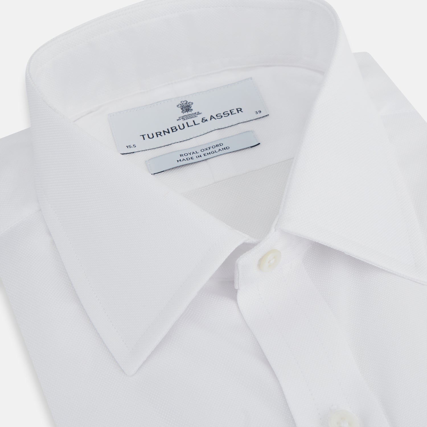 Image 2 of product The Turnbull & Asser White Superfine Oxford Cotton Shirt features a T&A collar and 3-button cuffs—ideal for elegant evening attire, shown against a white background.