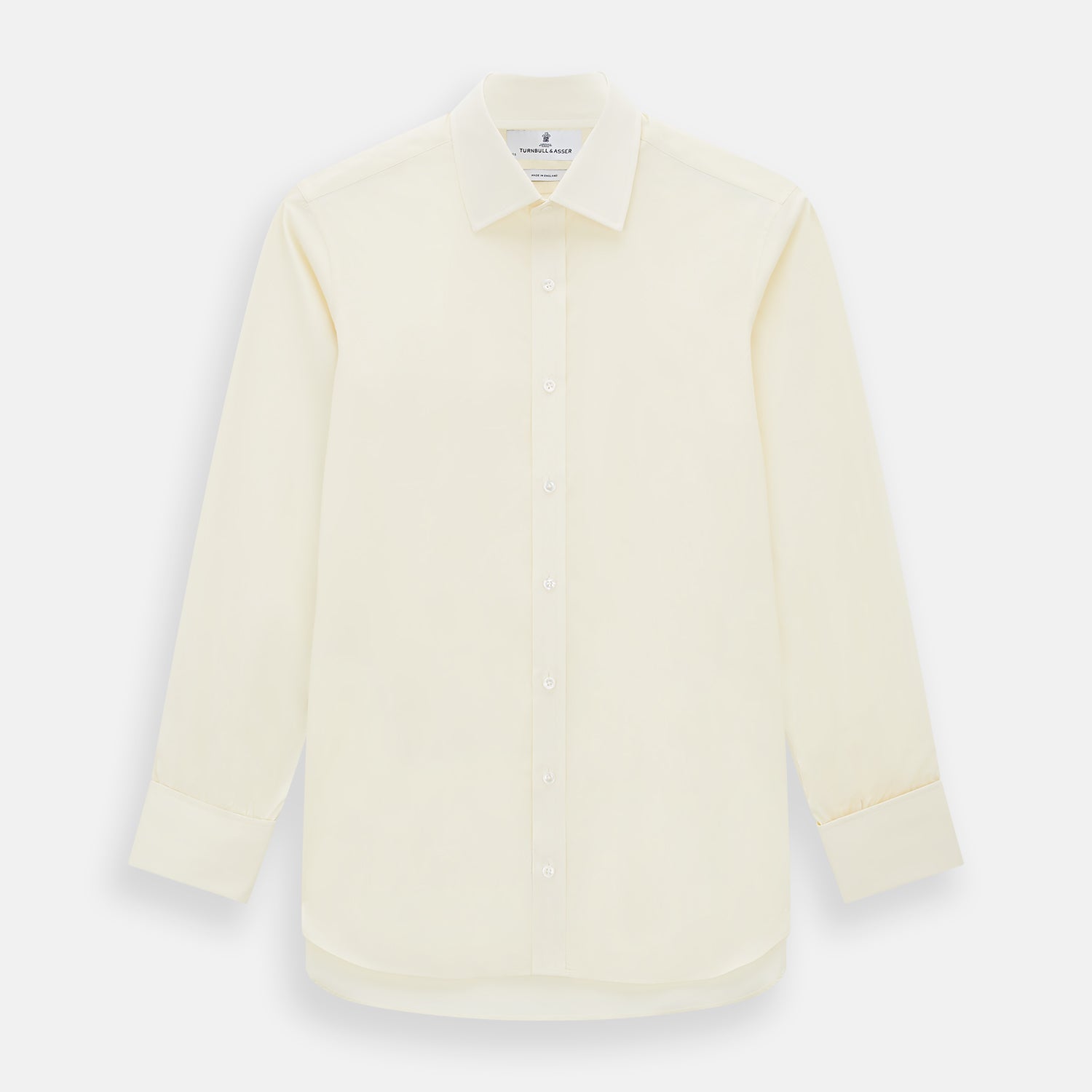 Image 1 of product The Turnbull & Asser Cream Cotton Shirt features a T&A collar and double cuffs, elevating men's style. Displayed flat against a white background, this long-sleeve shirt is crafted in classic cream cotton.
