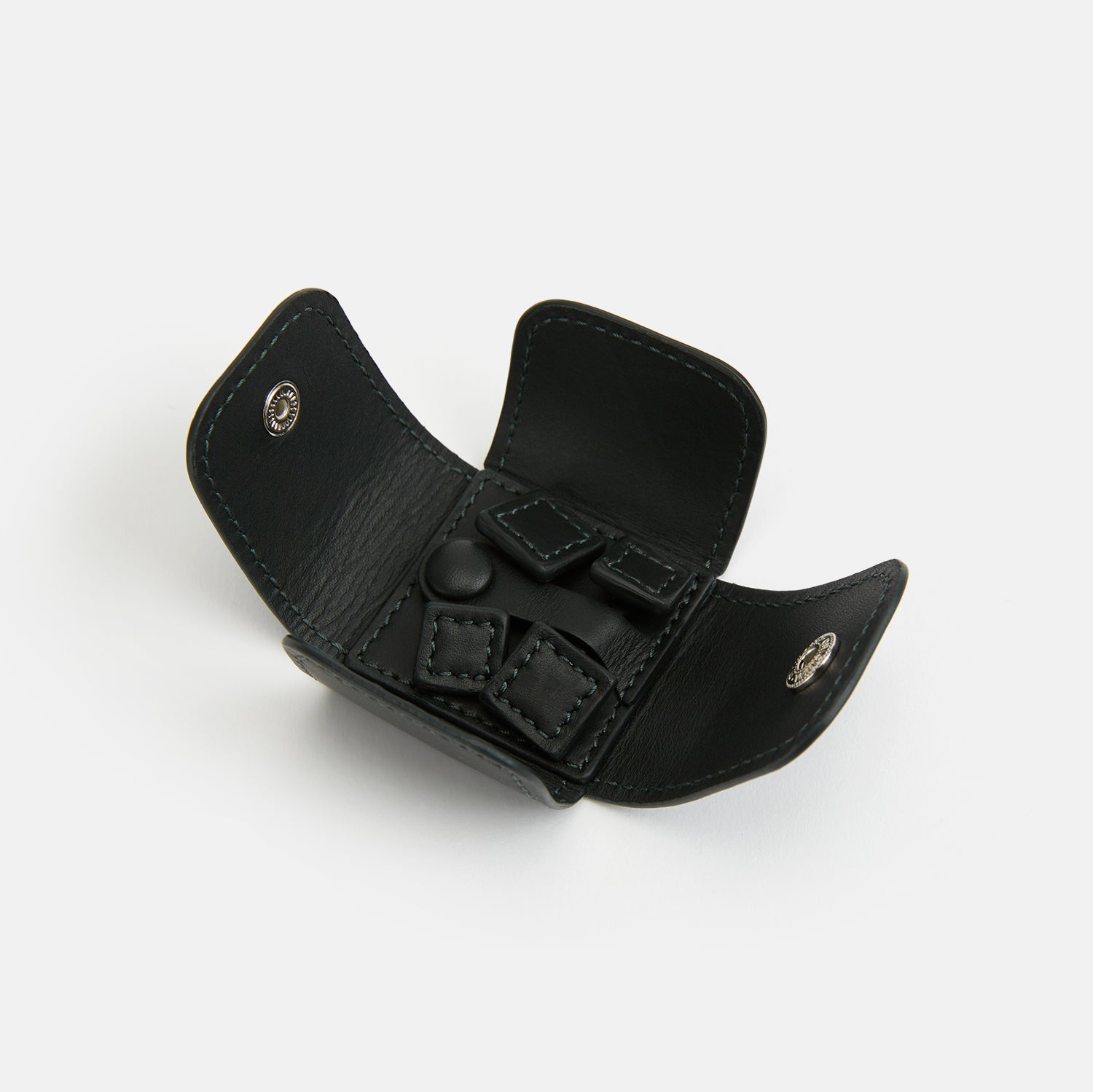 Image 2 of product Turnbull & Asser Forest Green Leather Cufflinks feature square ends, visible stitching, and braided leather connectors, displayed on a white background—a refined choice in men's accessories.