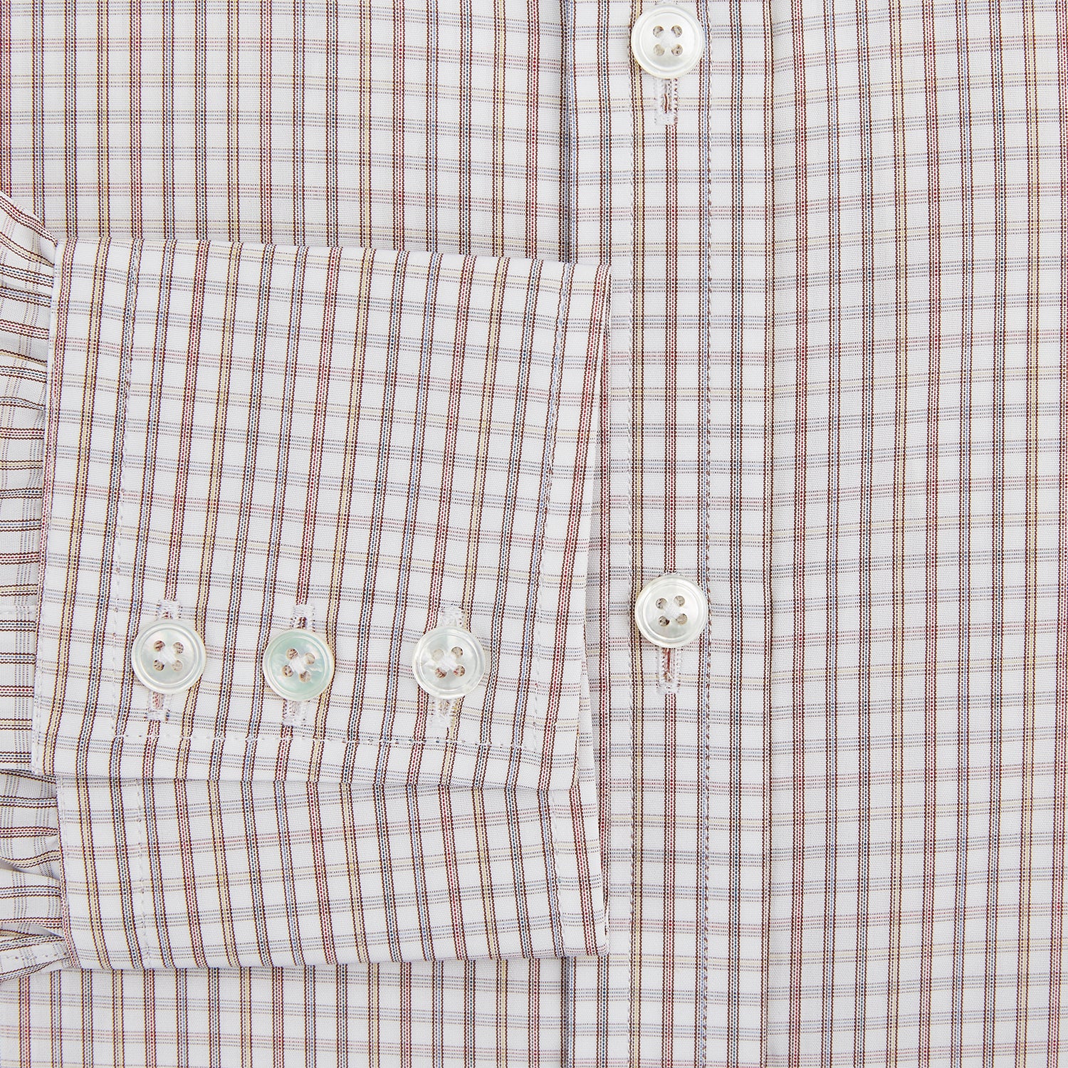 Image 4 of product The Turnbull & Asser Multicoloured Check Mayfair Shirt is a long-sleeve, button-up shirt with a classic collar and buttoned cuffs, showcasing a true British checkered pattern on a white background.