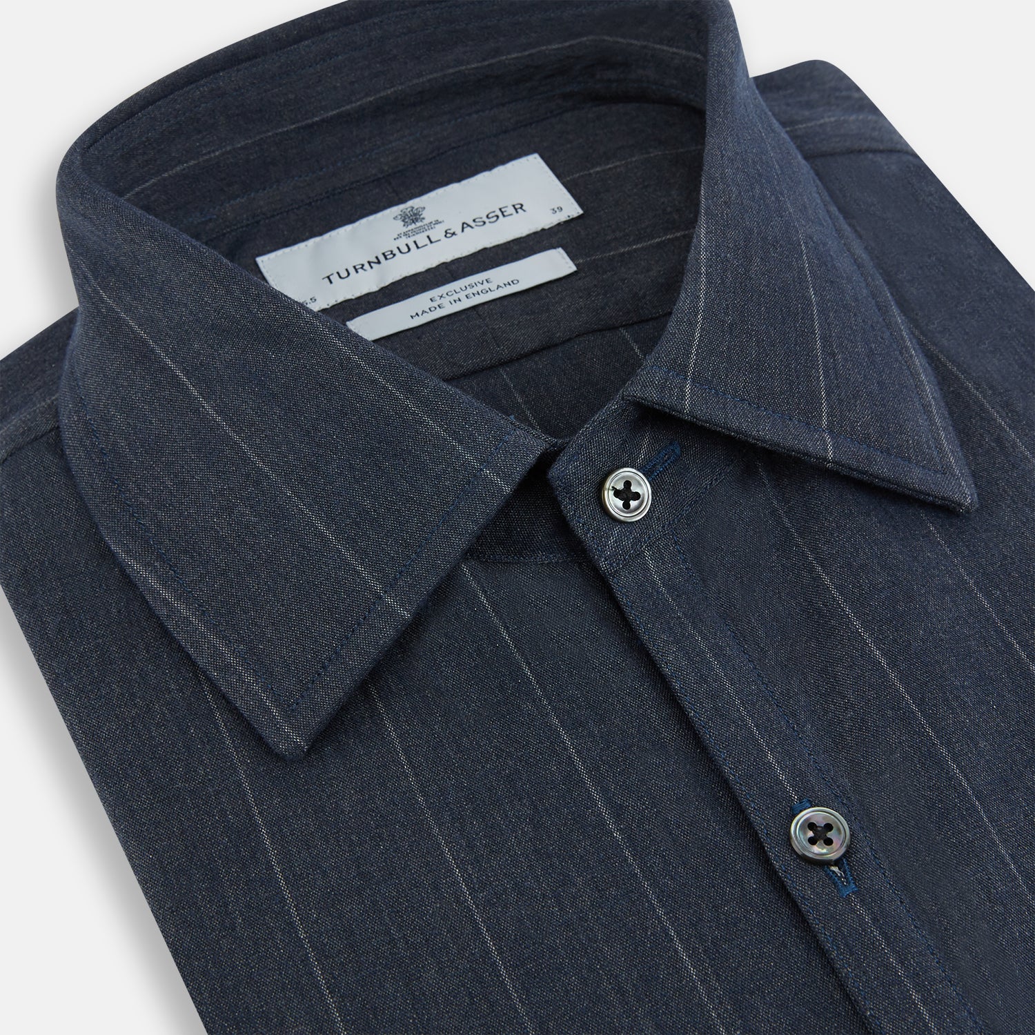 Image 2 of product The Turnbull & Asser Navy Melange Wide Stripe Westminster Shirt features a classic collar, buttoned cuffs, and a tailored fit, showcasing British craftsmanship. Laid flat on a white background.