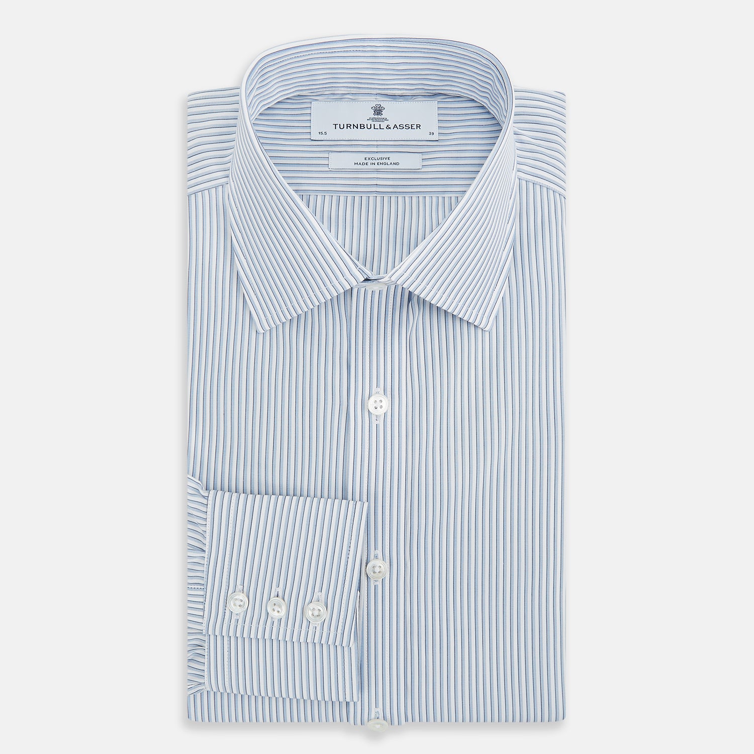 Image 5 of product The Turnbull & Asser Sky Blue Shadow Pinstripe Mayfair Shirt, a long-sleeved, button-up shirt with a T&A collar and light blue and white thin vertical stripes, is displayed flat on a white background.