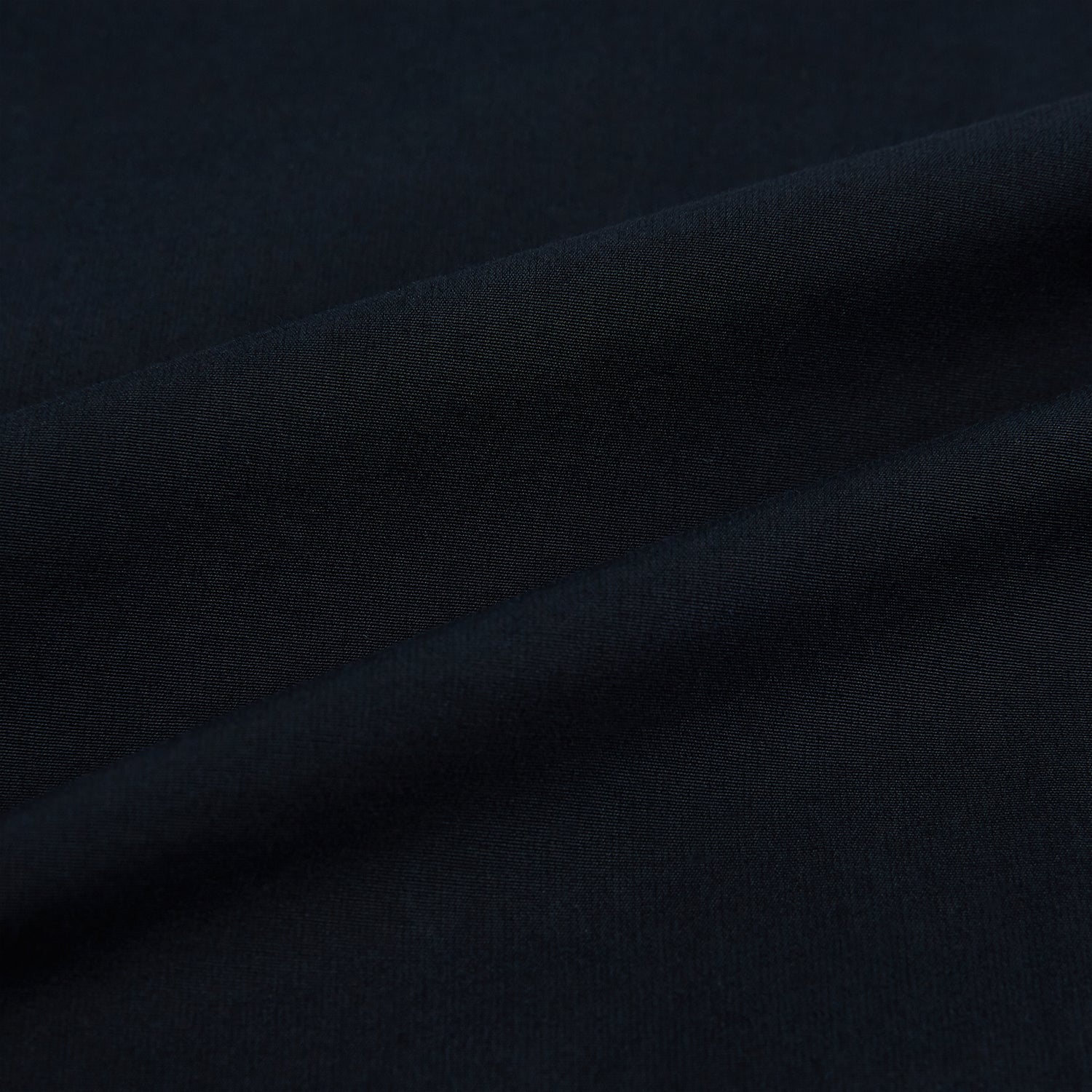 Image 8 of product The DARK NAVY WINDSOR SHIRT by Turnbull & Asser is a long-sleeve shirt with a refined Windsor collar, showcasing classic British craftsmanship.