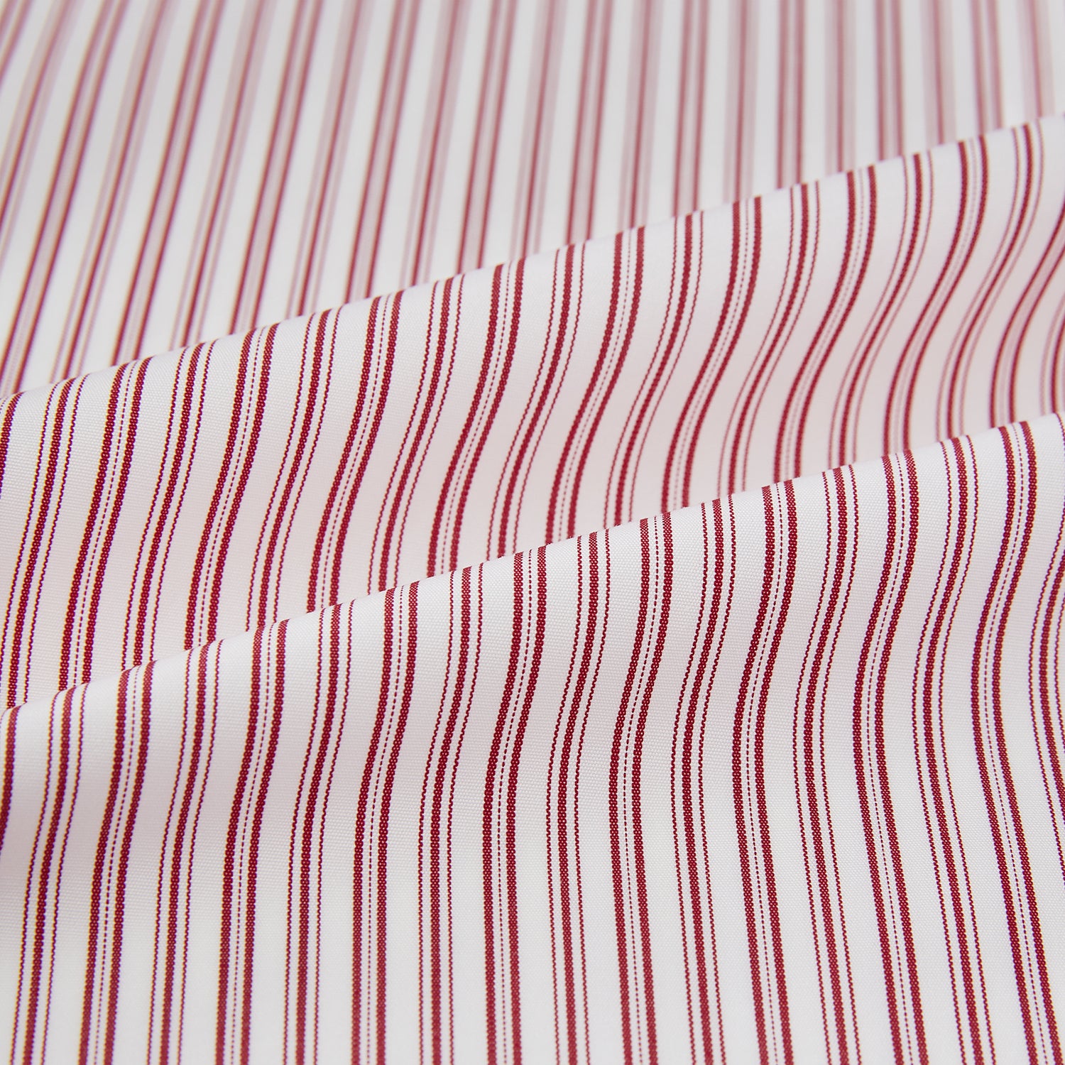 Image 8 of product The Red Ticking Stripe Westminster Shirt by Turnbull & Asser features long sleeves, a button-up front, and vertical red and white stripes, shown flat on a white background.