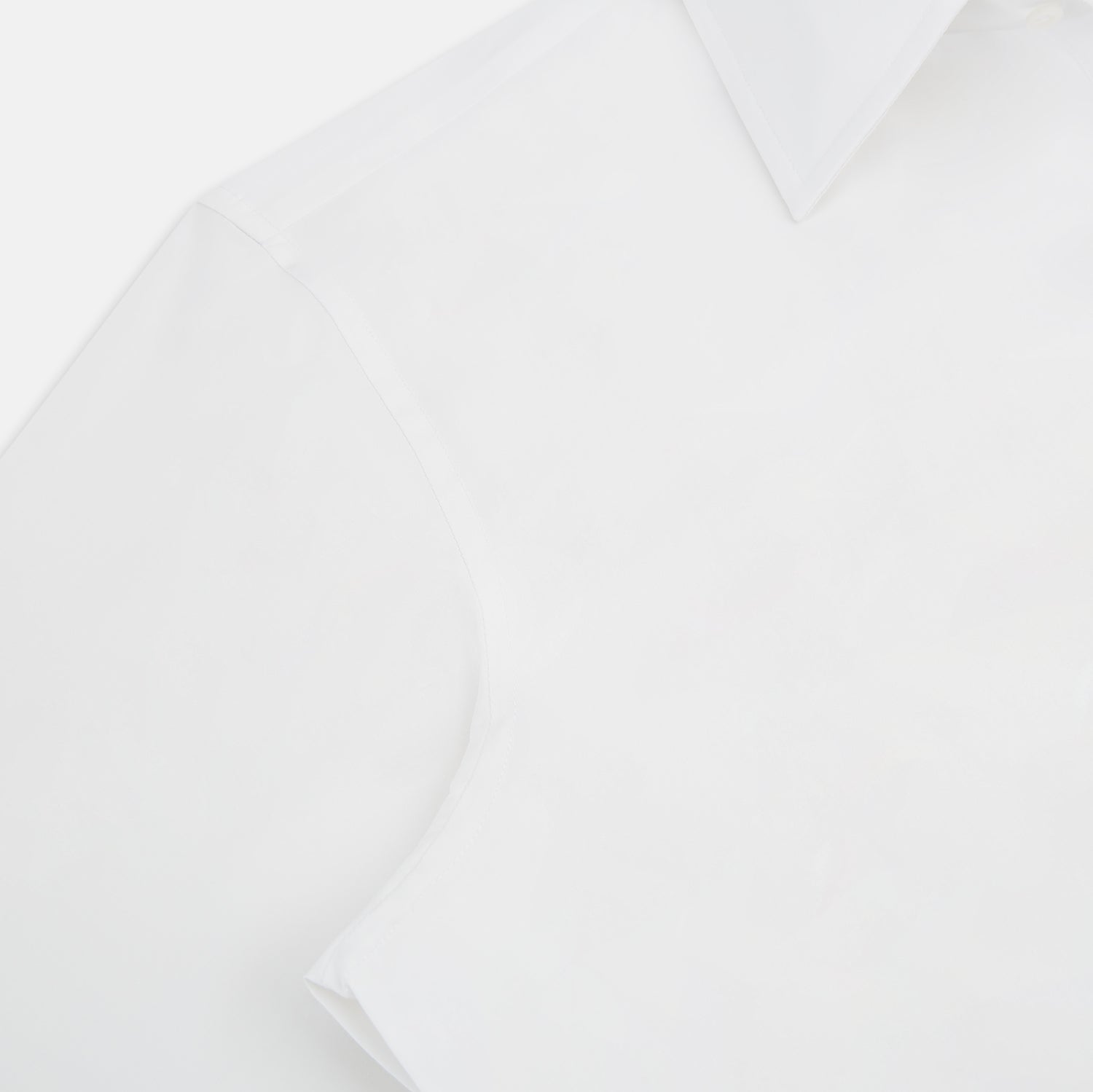 Image 6 of product The Turnbull & Asser White Westminster Shirt is a long-sleeve, button-up dress shirt with a classic cut and Westminster collar, shown on a white background.