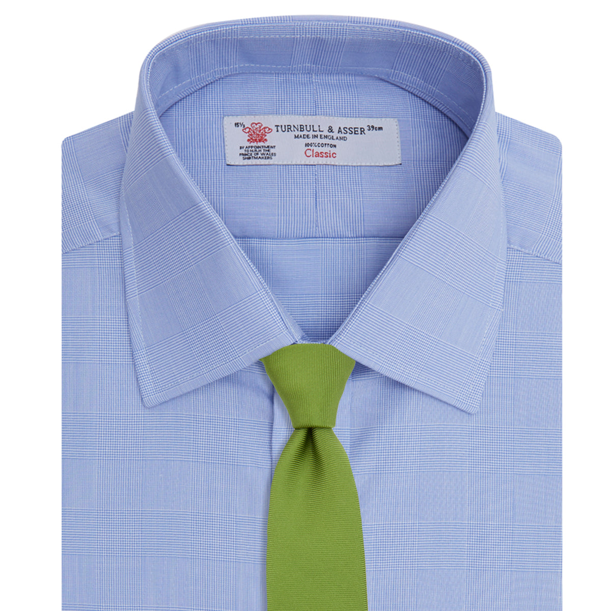 Image 4 of product A Blue Prince of Wales Check Shirt by Turnbull & Asser, featuring a T&A collar and 3-button cuffs, is neatly folded and displayed on a plain white background.