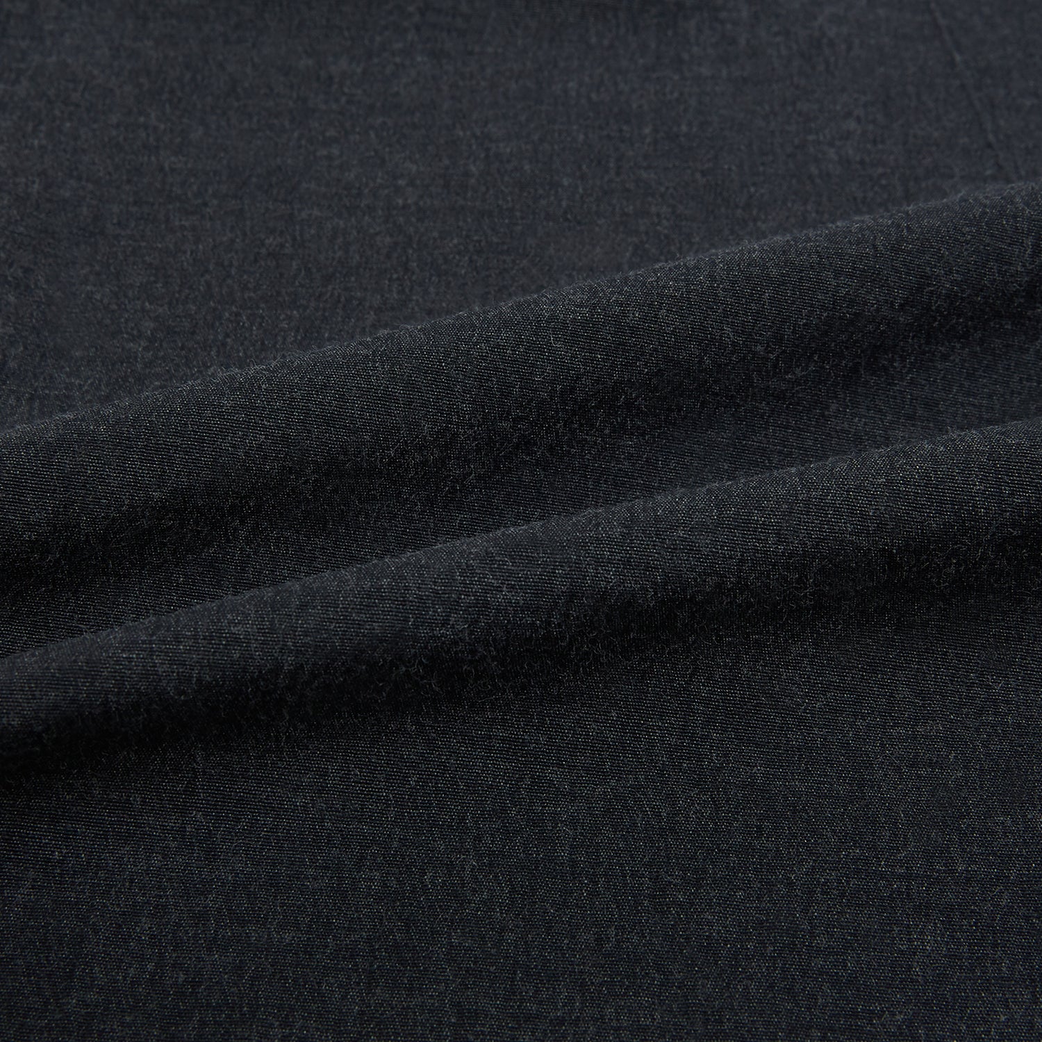 Image 8 of product The Turnbull & Asser Midnight Blue Westminster Shirt features long sleeves, a button-up front, classic collar, and buttoned cuffs in a plain design—showcasing British craftsmanship—laid flat on a white background.