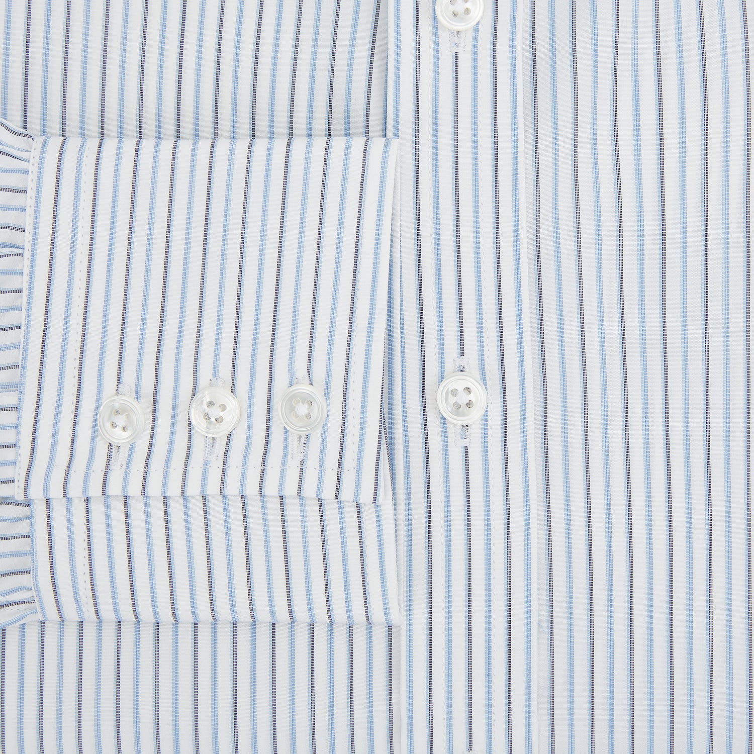 Image 4 of product The Turnbull & Asser Navy and Blue Shadow Stripe Mayfair Shirt, featuring a classic T&A collar and buttoned cuffs, is laid flat on a white background.