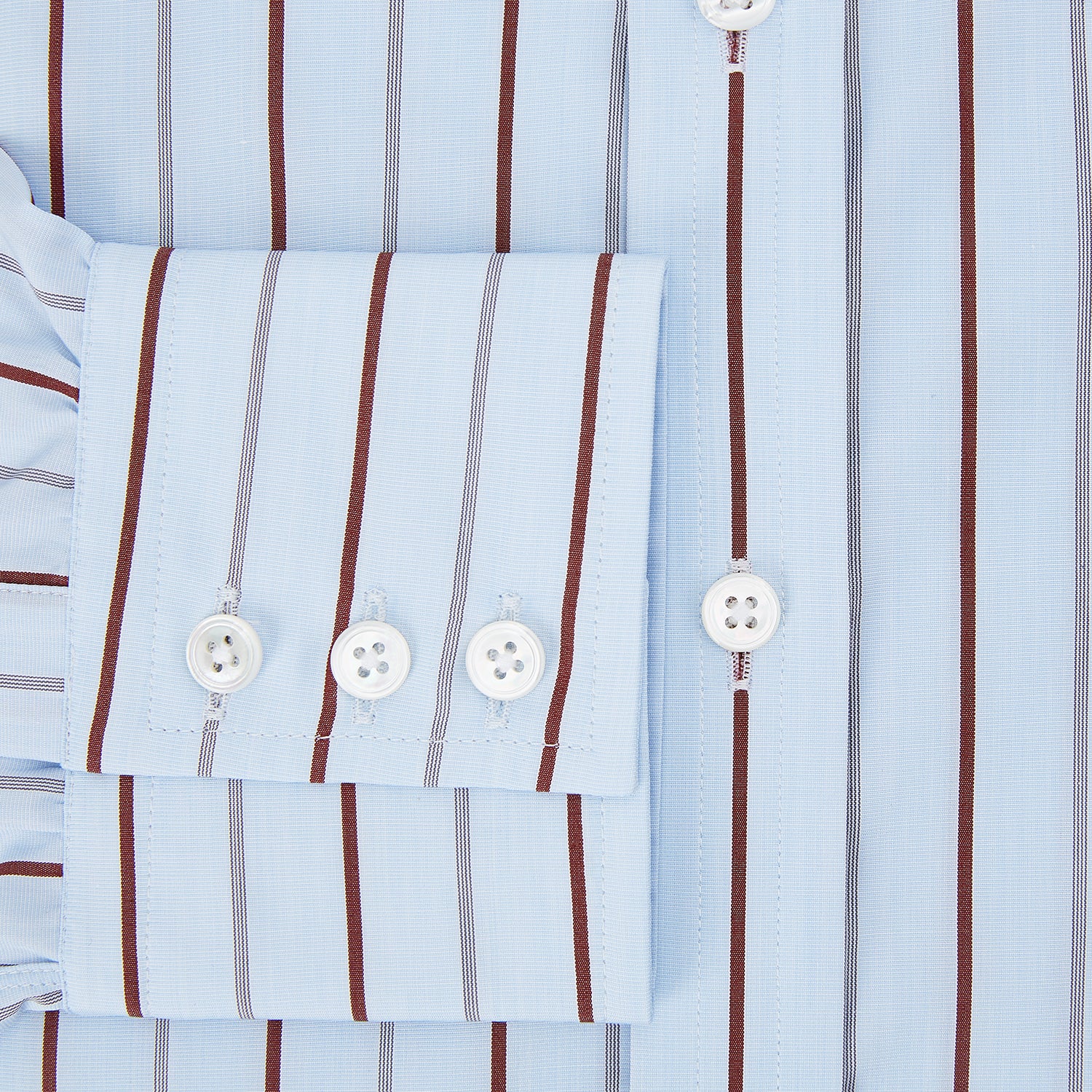 Image 4 of product The Turnbull & Asser Burgundy Wide Pinstripe Mayfair Shirt features a collared, long-sleeve design with bold vertical stripes, crafted in the refined Mayfair fit and displayed on a plain white background.
